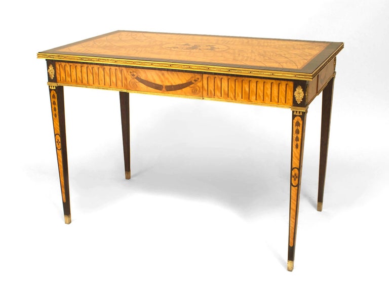 Continental Swedish (19th Century) satin maple and inlaid rectangular end table with a floral center medallion and swag design sides with bronze ormolu edge and mounts.

