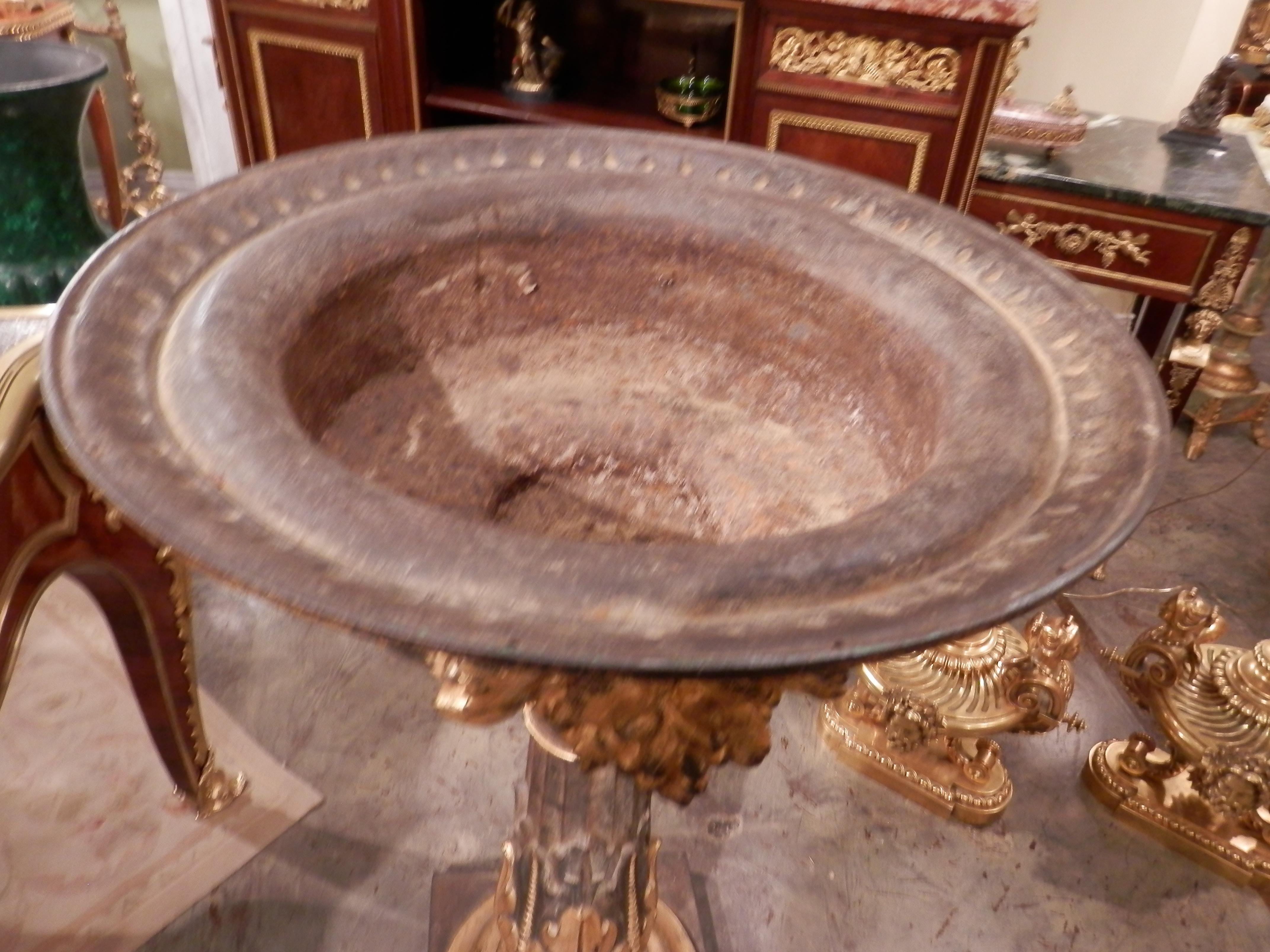 Large and impressive 19th century Continental iron and parcel gilt fountain or birdbath. Beautiful detail and quality.