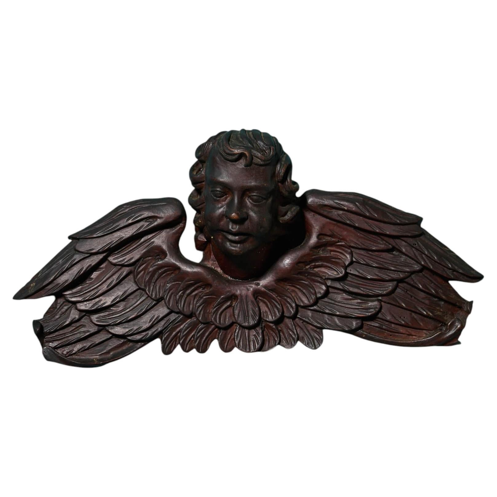 Scultura in legno di angelo in mogano continentale del XIX secolo