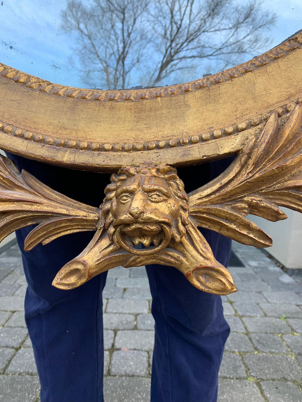 19th Century Continental Oval Giltwood Mirror with Trophy and Lion For Sale 1