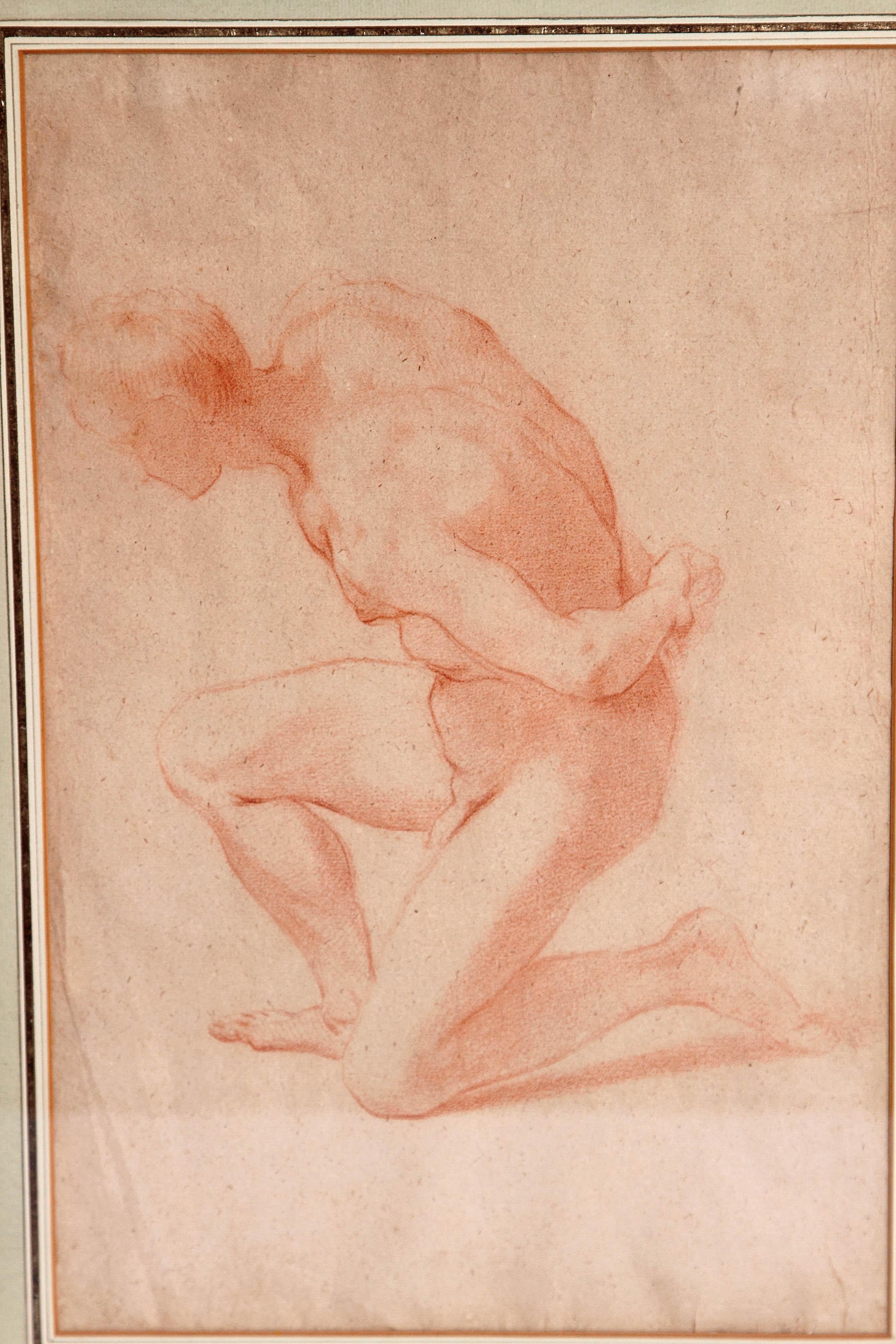 A realistically portrayed drawing of the male human figure kneeling with arms behind back. Modern matting and framed under conservation glass. Image measures 10.5