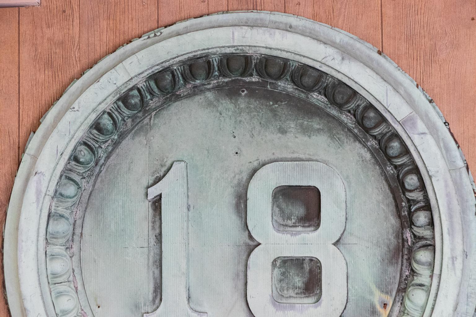 Circa 19th century salvaged copper architectural facade markers with the date 1886 framed by egg-and-dart trim. Please note of wear consistent with age and exposure to the elements including oxidation and patina to the metal.