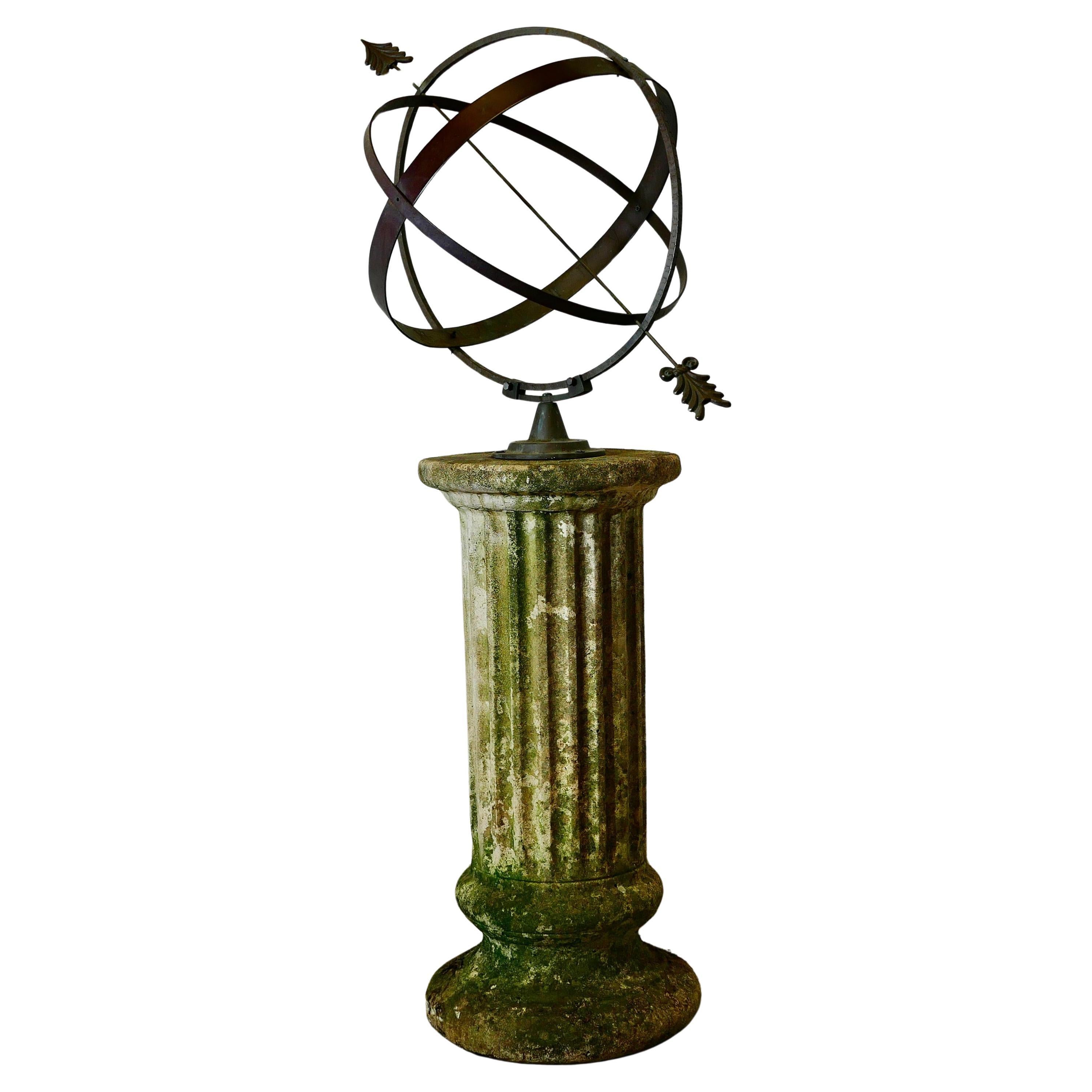 Sphère armillaire en cuivre du XIXe siècle sur un piédestal en pierre