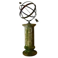 Sphère armillaire en cuivre du XIXe siècle sur un piédestal en pierre