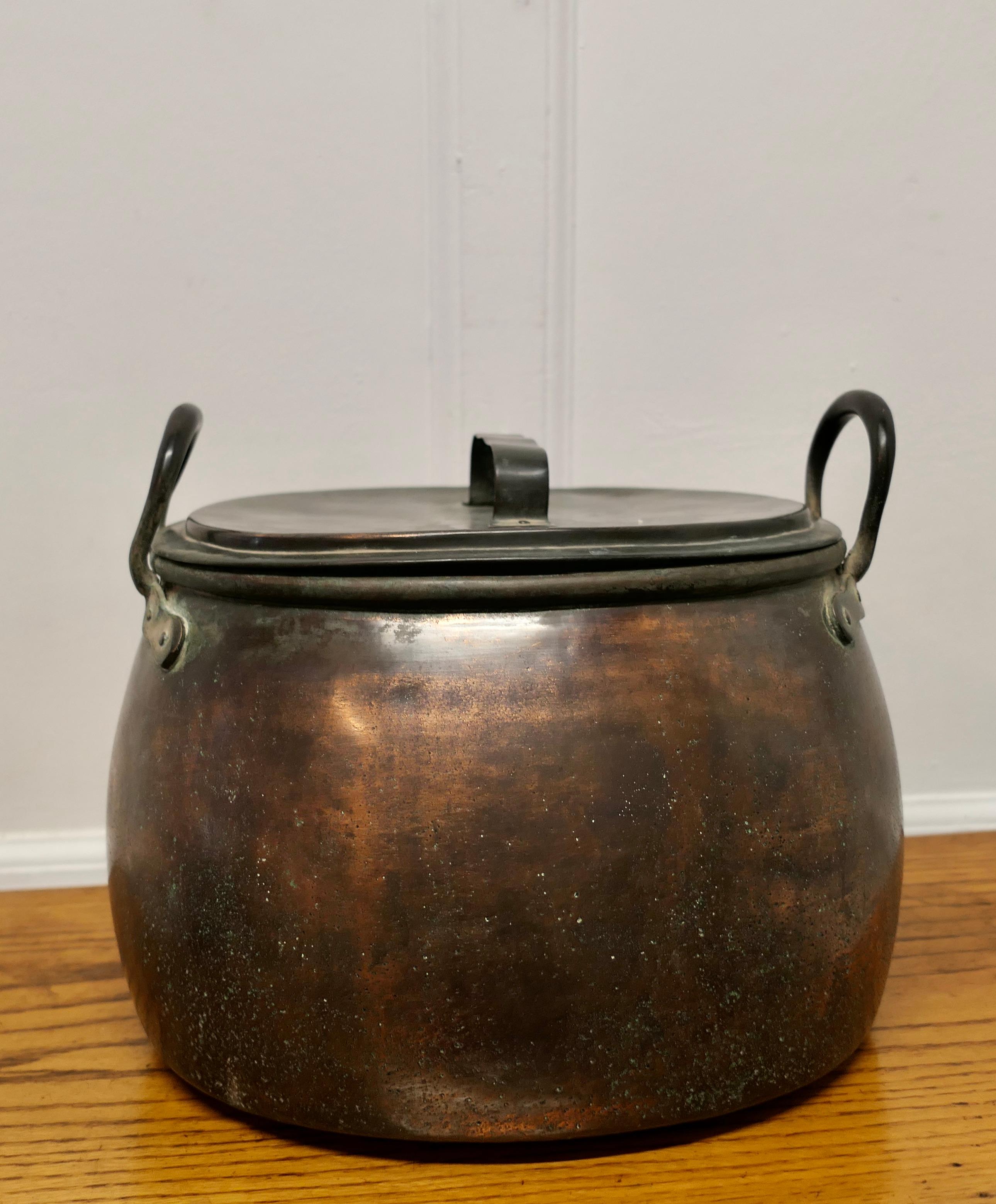 19th Century Copper Cooking Pot, Cauldron with Lid  

This is a lovely looking and very rare find, a 19th Century cooking pot, this piece is totally original just as though it came straight from the fire
The lid fits tightly and there are no holes