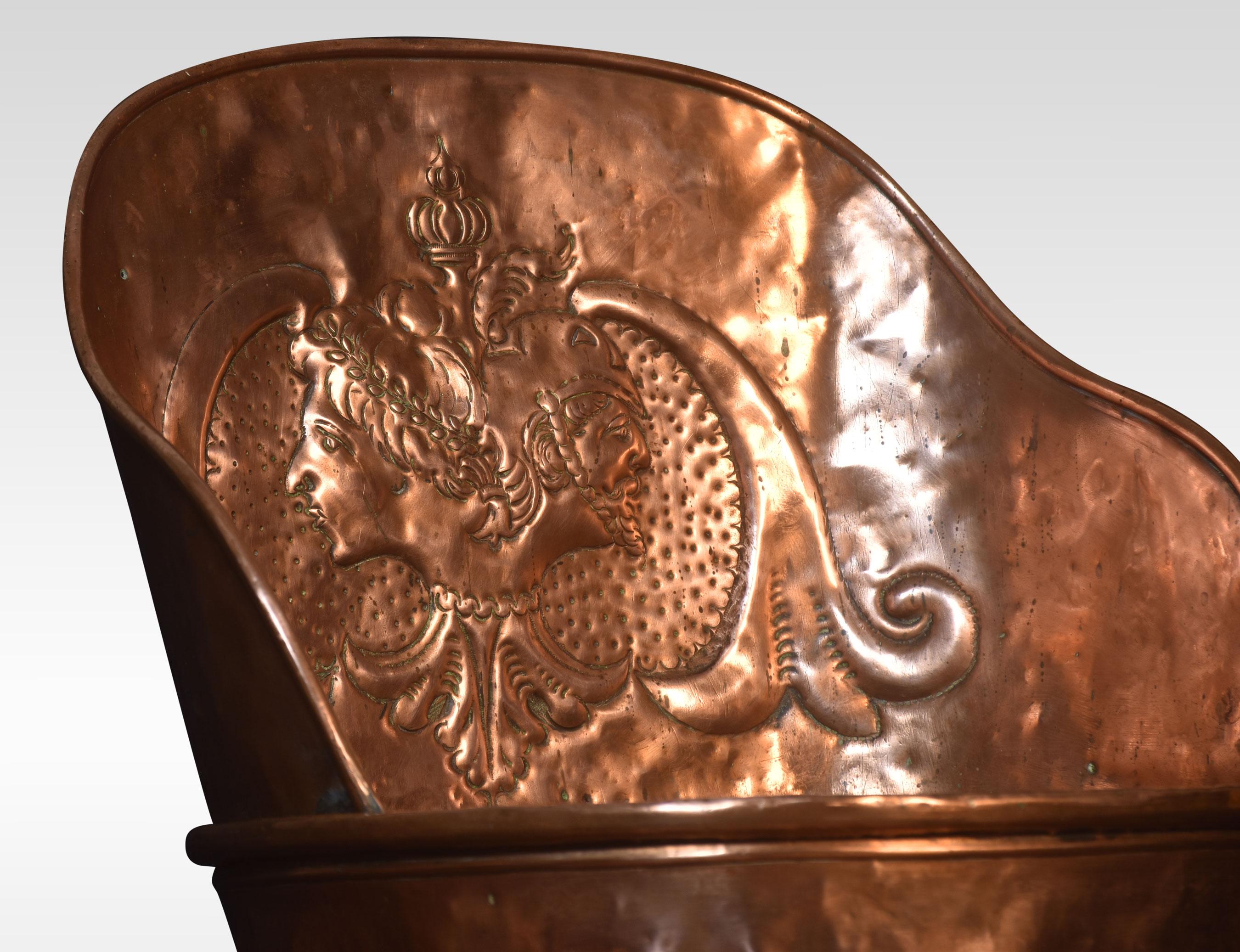 19th century large copper grape hod with embossed floral decoration raised up on circular stepped base.
Dimensions
Height 33.5 inches
Width 16.5 inches
Depth 15.5 inches.