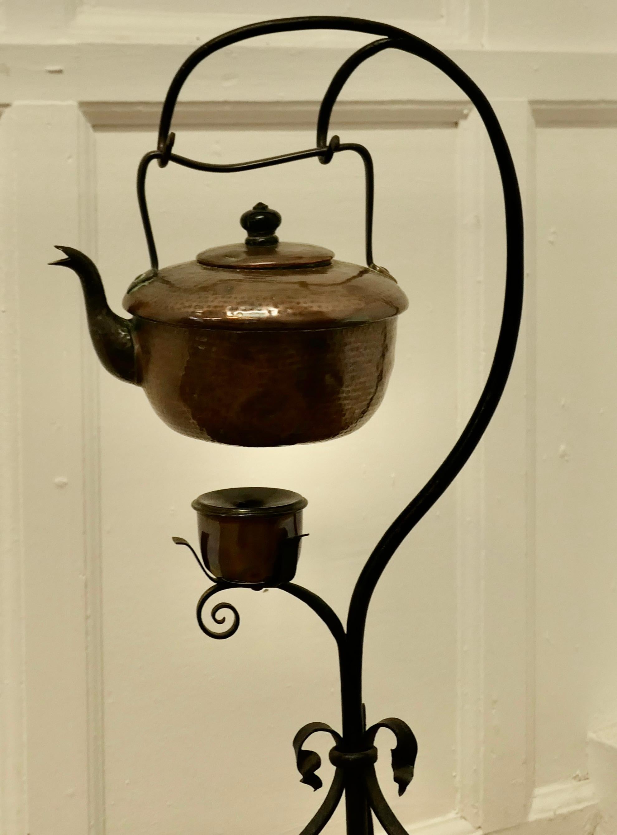 Folk Art 19th Century Copper Swinging Sprit Kettle on a Wrought Iron Stand For Sale