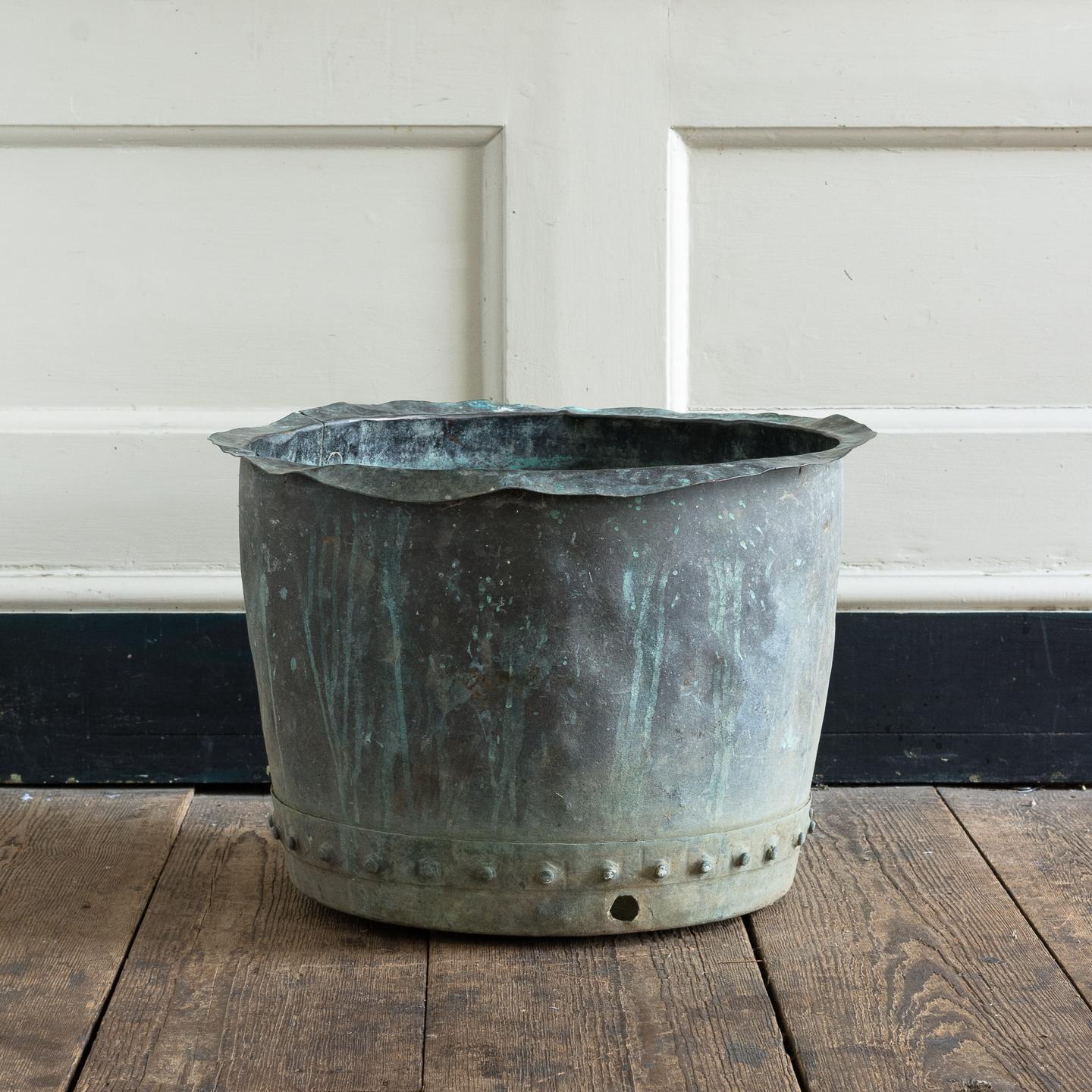 19th century riveted copper vat with patinated exterior.