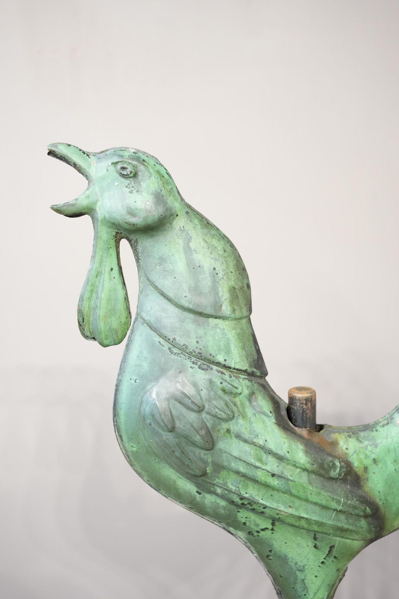 This is a great piece of folk art. Genuine 19th century verdigris green copper weathervane in the form of a cockerel. It is a great decorative size and is mounted on a later but well crafter metal base. The patina is superb but what I love is the