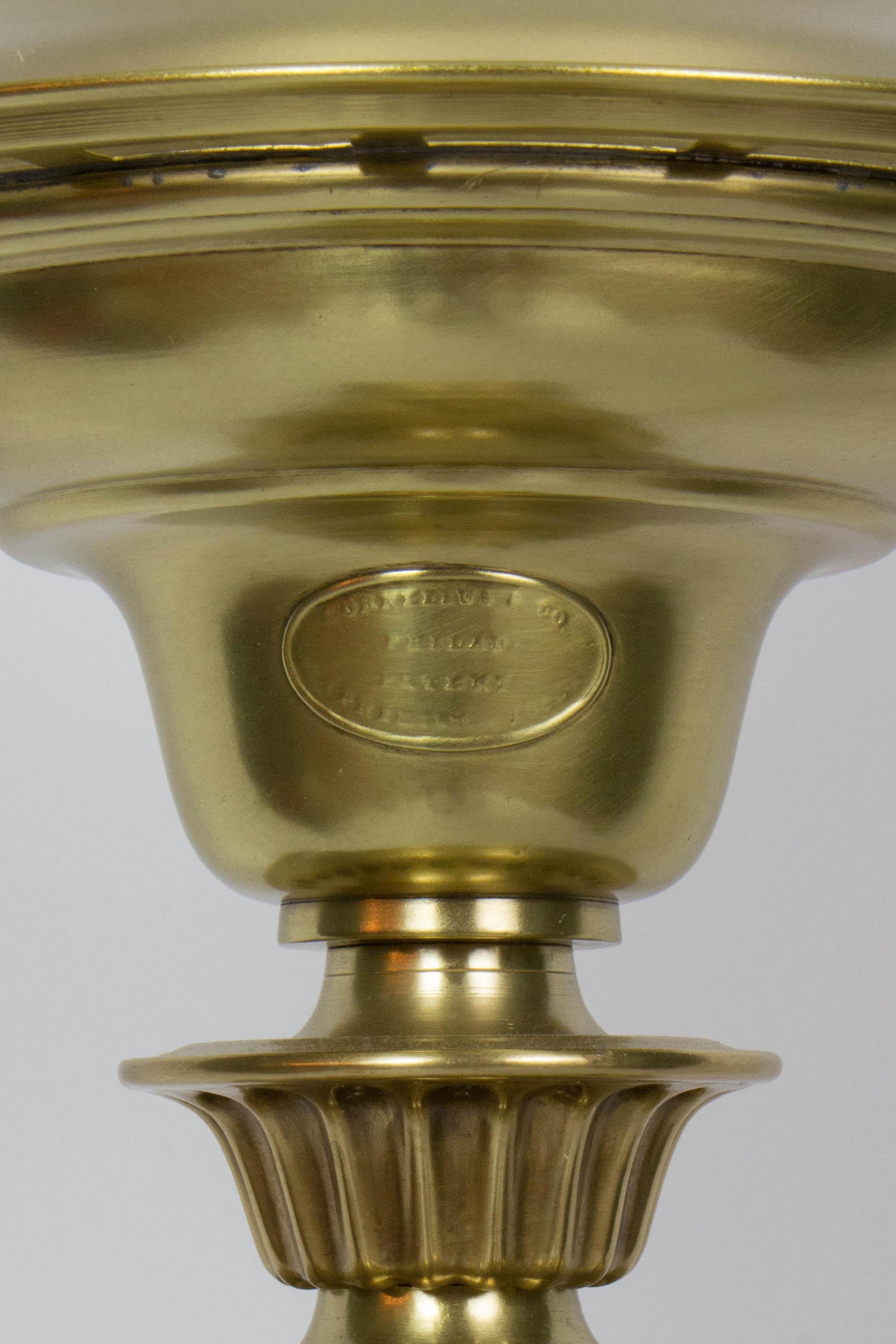 Cornelius & Company Astral lamp. A distinguished piece for a study or office. Brass Column form with finely cast acanthus leaves. Shade is mouth blown, frosted cut glass. C. 1850. Electrified, replacement glass.