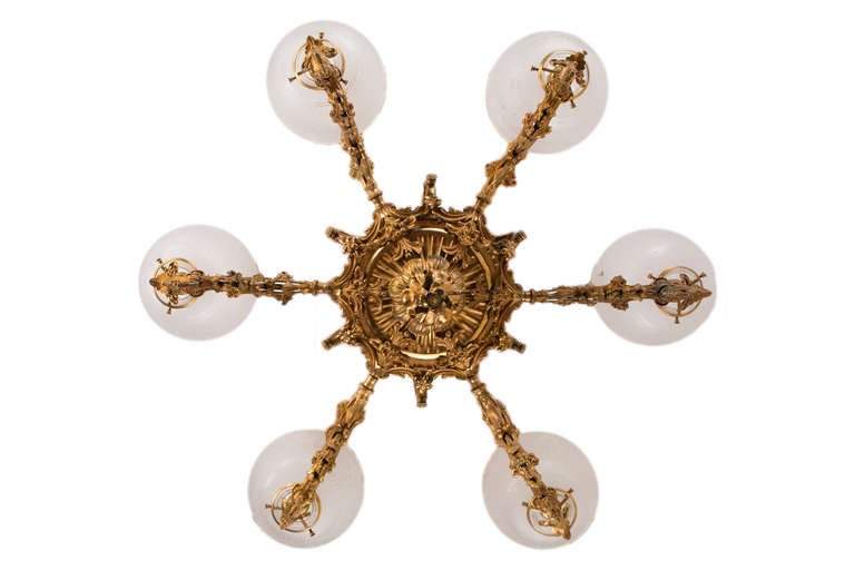 A period, rare and very impressive 19th century American Victorian gilt bronze Rococo Revival six-arm gas chandelier by, Cornelius & Baker, Philadelphia, PA which has been electrified and is highly decorated with mythological figures cast figures on