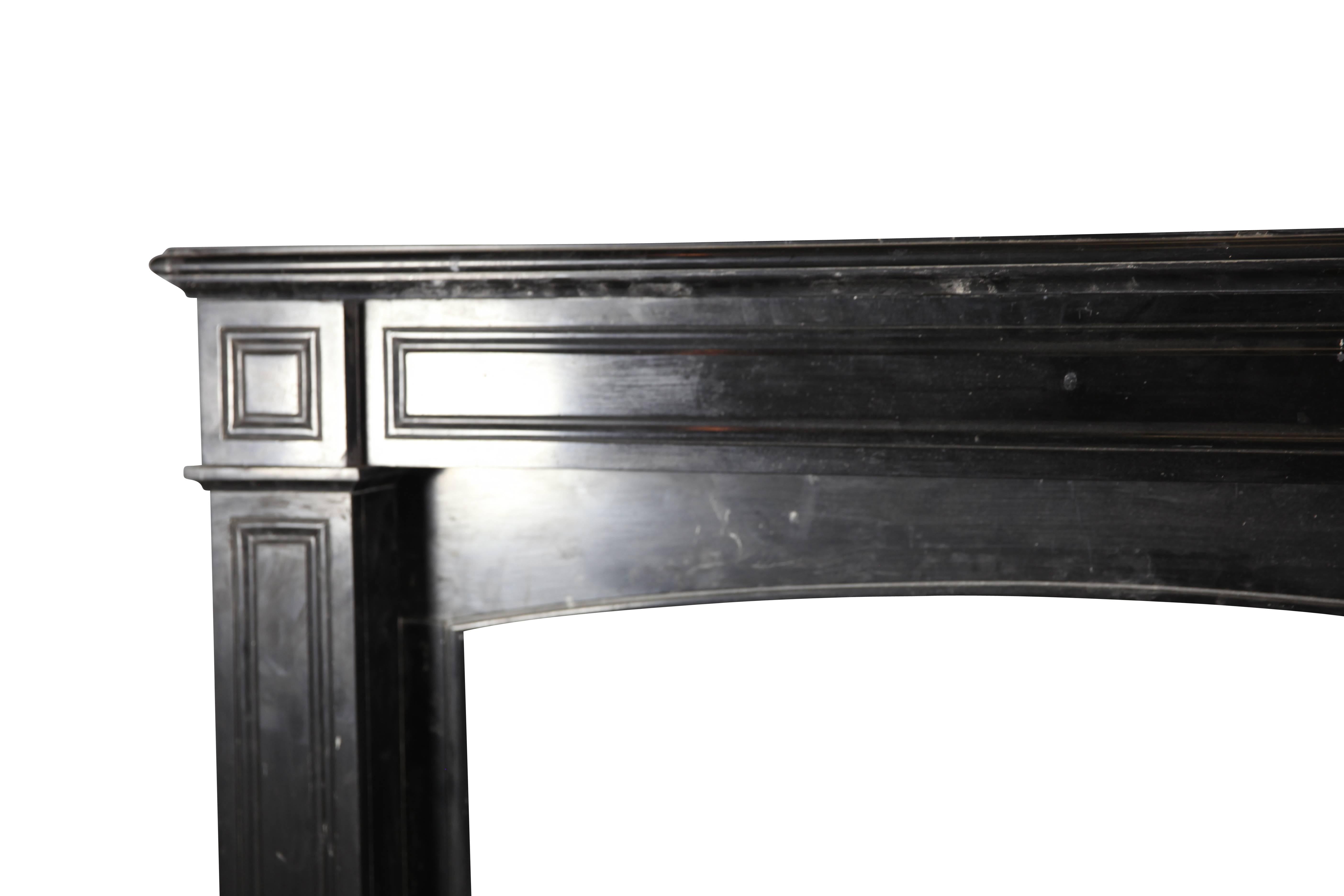 This antique fireplace surround is made out of Black Belgian marble. It has oxidized elements and parts. A chimney piece for a French elegant country style interior design. The piece has a great price.
Measures:
139 cm EW 54.72