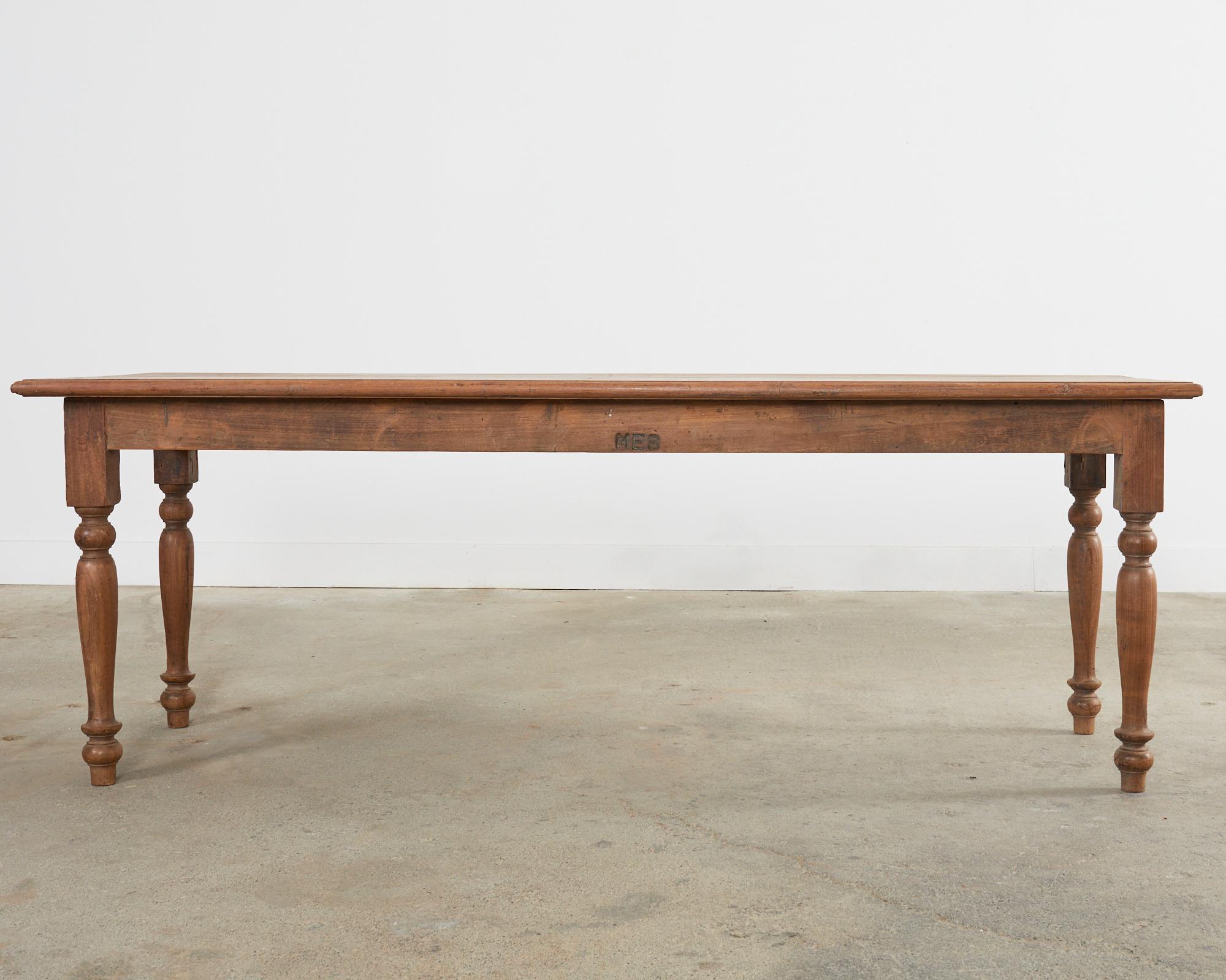 Hand-Crafted 19th Century Country English Provincial Elm Farmhouse Dining Table For Sale