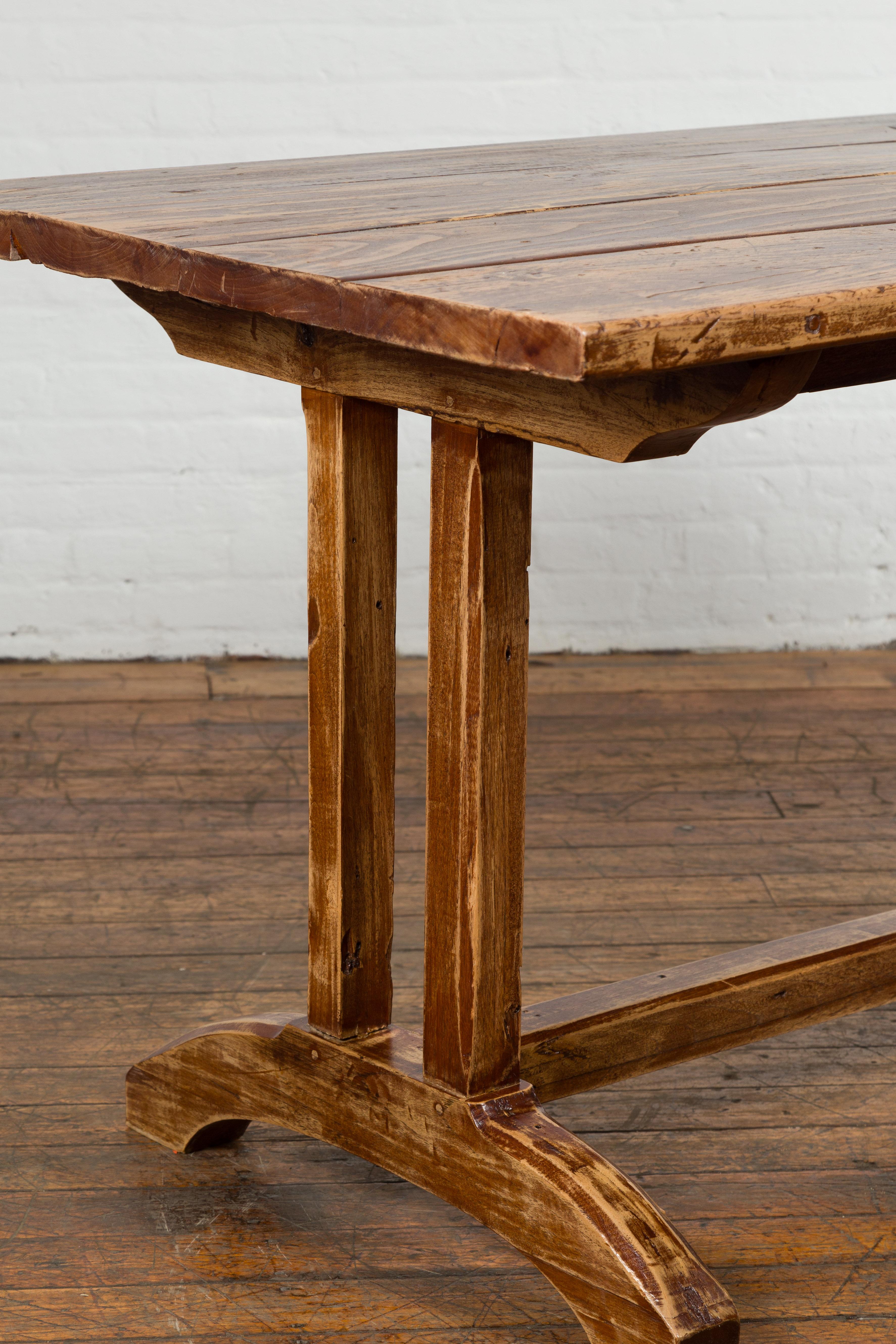 19th Century Country Farmhouse Table with Trestle Base and Distressed Finish For Sale 4