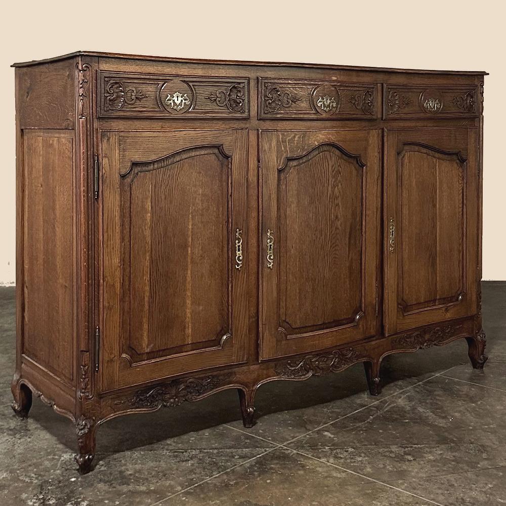 19th century Country French Buffet ~ Enfilade is a Classic expression of rural cabinetmaking, where form and function were equally important. handcrafted from solid planks of old-growth seasoned indigenous oak, it features a plank top with subtly