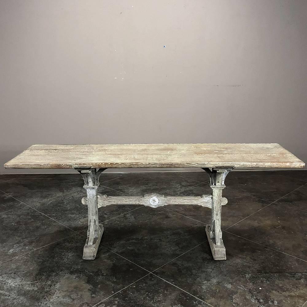 19th century Country French Cerused Louis XIIITrestle table features generous overhangs so two can sit at both ends of the table, and thanks to the twin pedestal with contoured trestle design, plus the fact that with the solid plank top no apron is