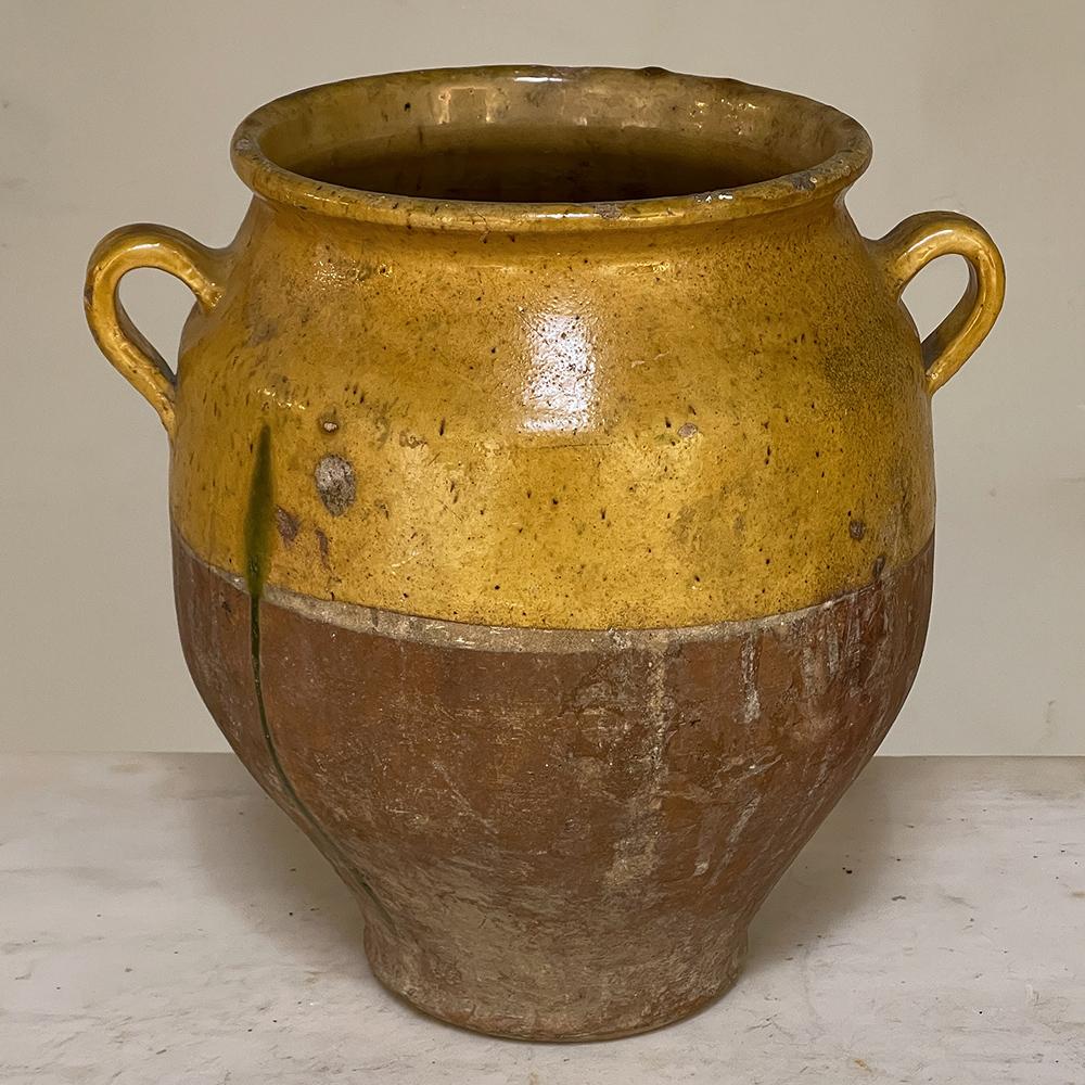 19th Century Country French Confit Pot is a fine example of the pinnacle of evolution of the clay pot as used for foodstuff storage. The concept dates back thousands of years, and nobody knows for sure when some genius realized that by leaving the