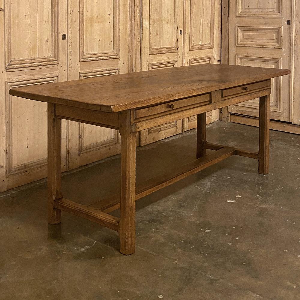 19th century country French desk ~ farm table with sliding drawers is a superlatively preserved example of rural artisanry designed for generations of daily use, yet with an unusual design feature. Typical thick plank tops, leg timbers, and 