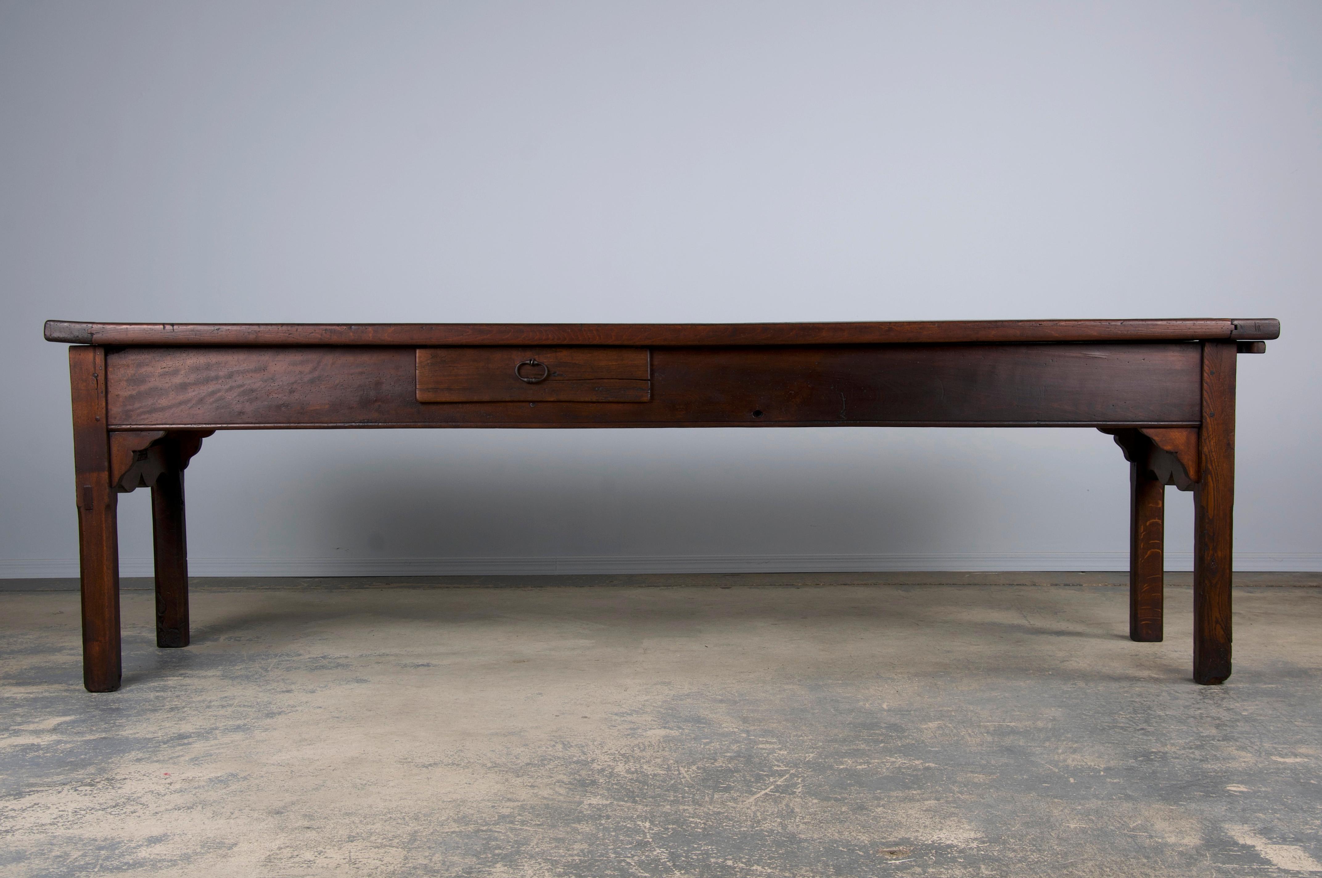 Monumental early 19th-century country French farmhouse harvest kitchen table sourced from Provence, France. Beautifully hand-crafted from solid oak wood featuring a 99