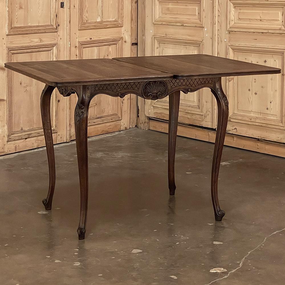 19th Century Country French Flip-Top Side Table ~ Game Table is a remarkable example of French ingenuity! Hand-crafted from solid oak, it features a grooved top that is hinged on the back, and designed to swivel 90 degrees whereupon the top can flip