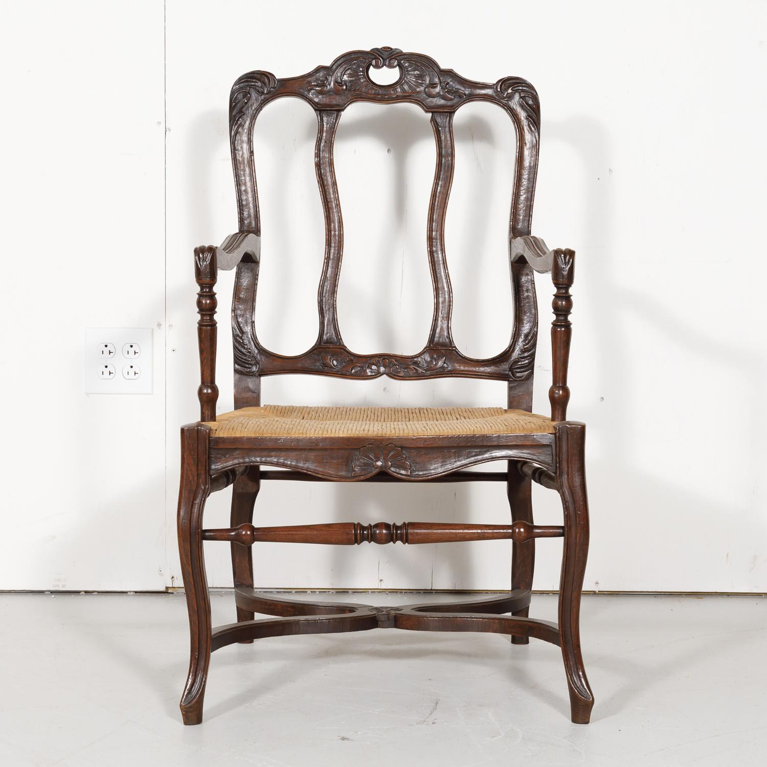 19th Century Country French Hand Carved Oak Rush Seat Armchair In Good Condition In Birmingham, AL