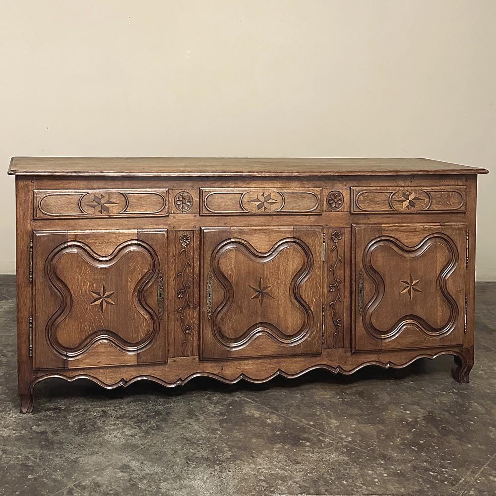 19th Century Country French Inlaid Buffet is a charming example of the genre, styled with tailored lines compared to most French furnishings, yet still a design executed with flair!  Hand-crafted from select, dense, old-growth oak, it features a