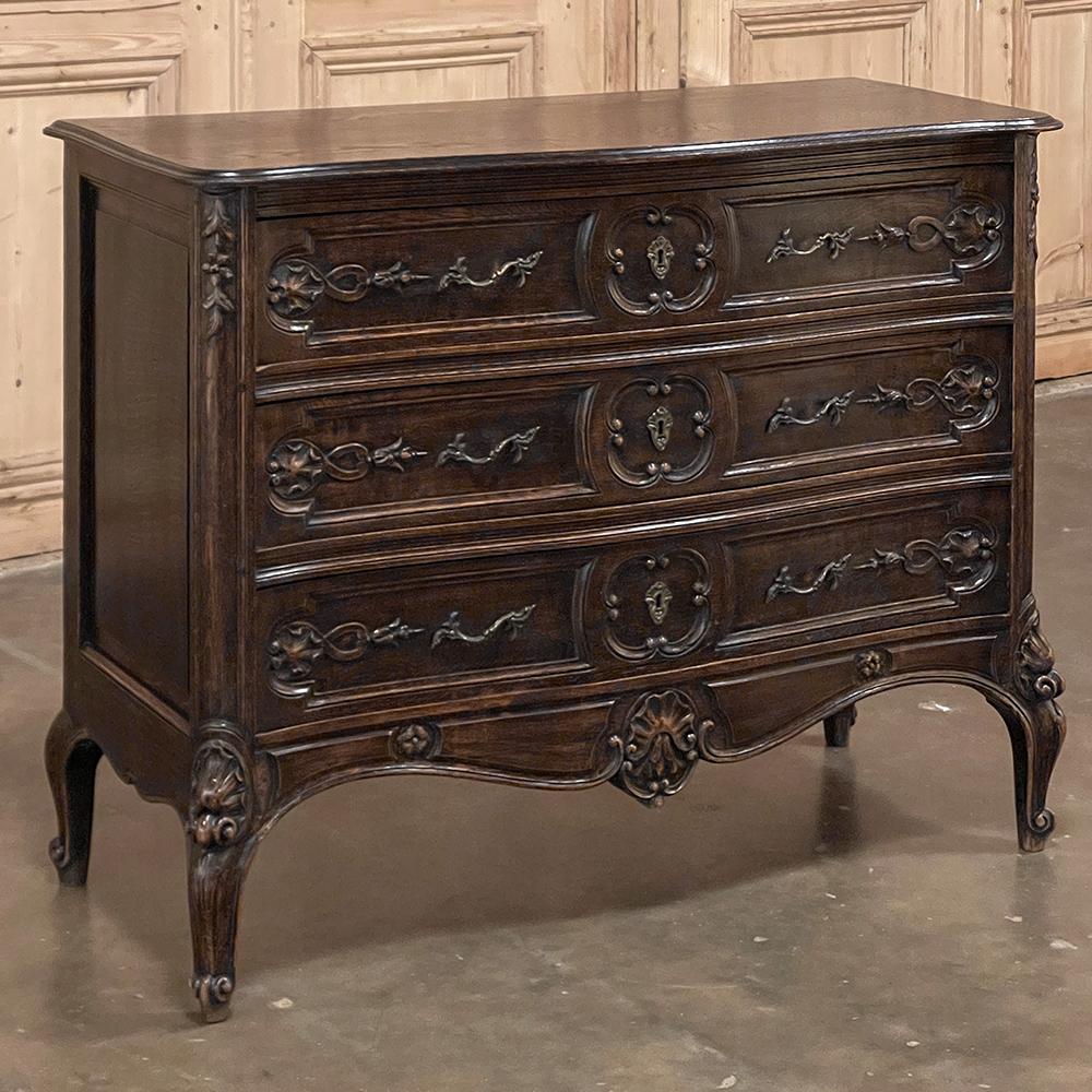 19th Century Country French Louis XIV Commode is a classic representation of the genre, crafted by master artisans from the finest materials to last for generations! Old-growth oak was hand-selected to create the to, which features a double-beveled