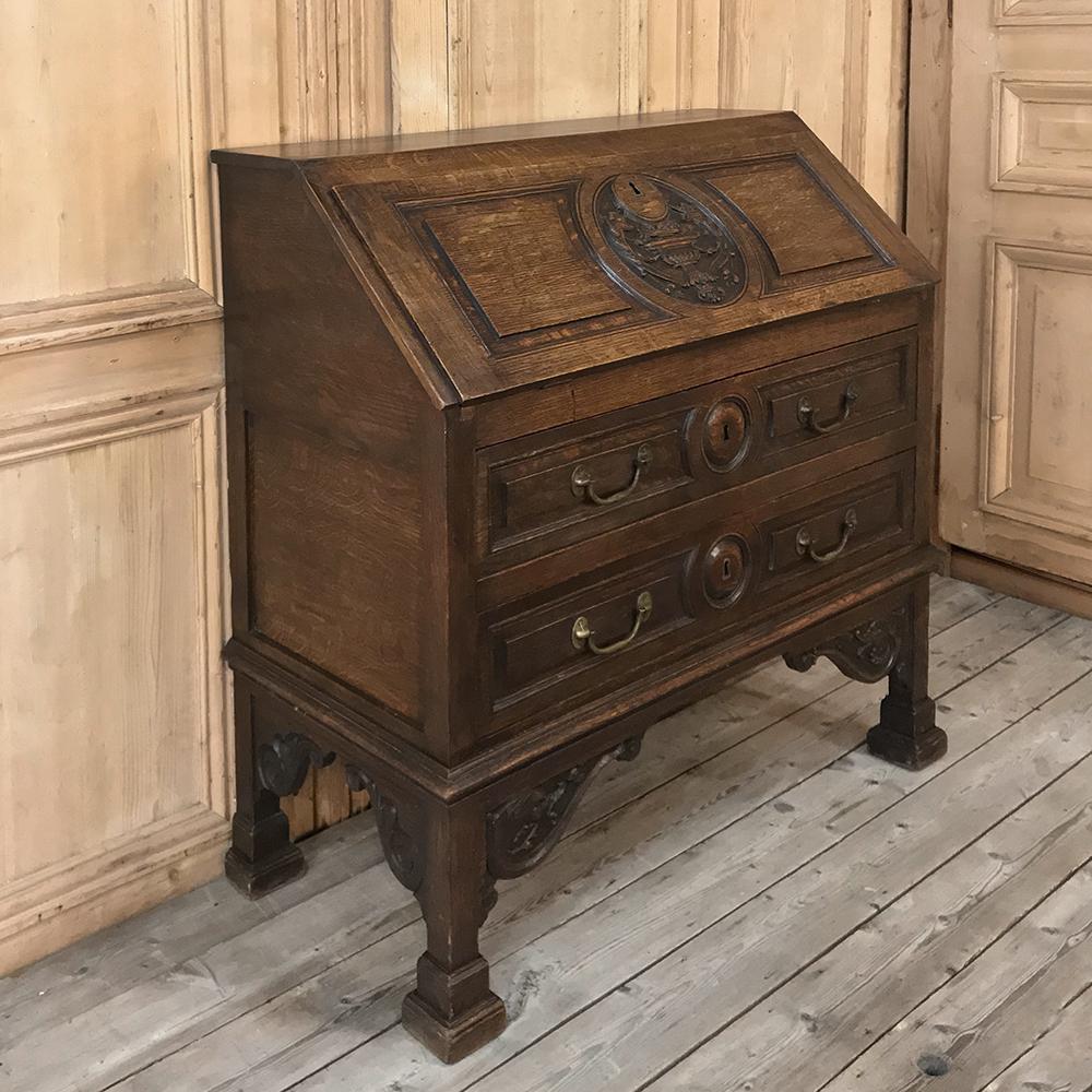 19th century Country French Louis XIV secretary was designed for centuries of daily use ~ hand carved from solid old-growth oak, and featuring styling that will never go out of fashion,
circa 1880s.
Measures: 39 H x 39 W x 19 D.