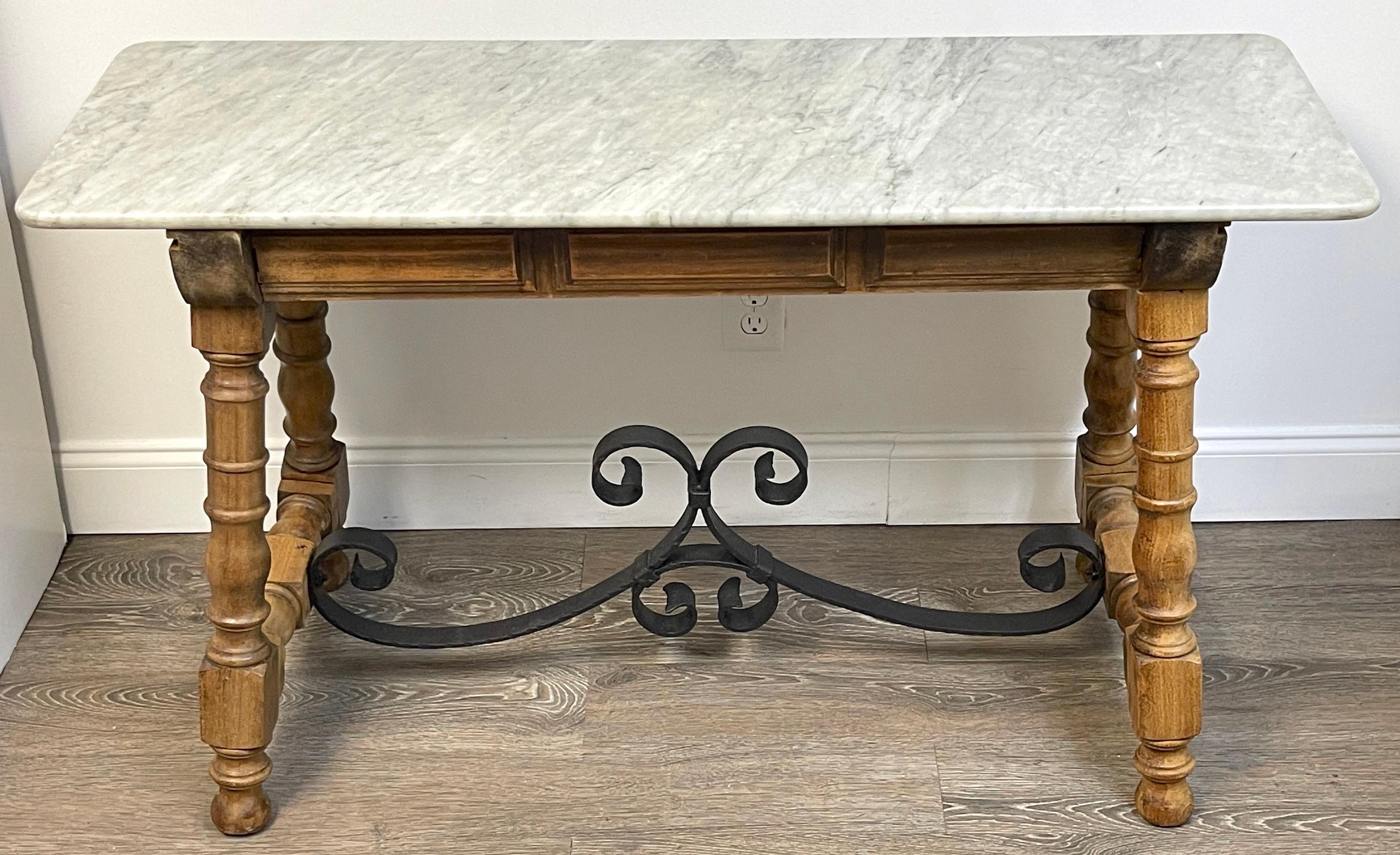 19th Century Country French marble top bleached pine & iron patisserie console /table
France, Circa 1880s
A  rustic of 19th-century French craftsmanship with this authentic Country French patisserie console/table. Made  in France during the 1880s,