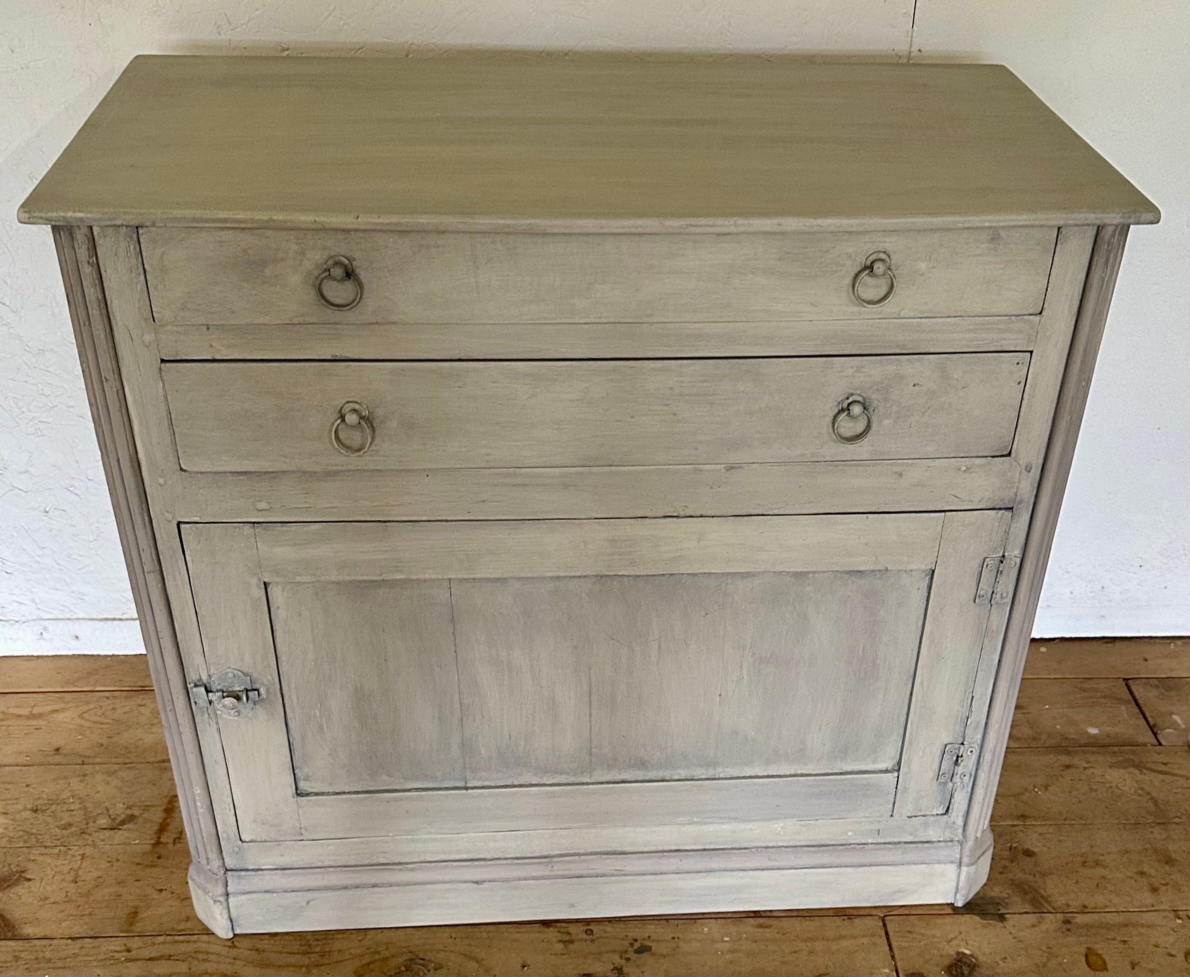 Rustic French provincial painted low cupboard or confiture.  Can be used as hallway piece or use in a bedroom for a side table, nightstand, in a bathroom or kitchen for extra storage.
The cabinet has solid wood construction, newly repainted in a