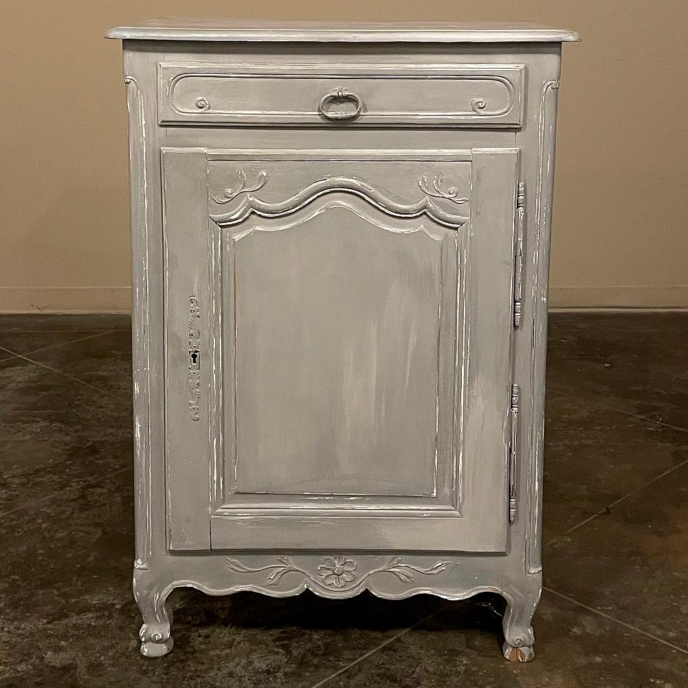 19th Century country French painted confiturier ~ cabinet is a charming ode to the rural life in France, but with typical French flair! The beveled top is only 18 inches deep, making it very traffic friendly. A full width drawer with just a modicum
