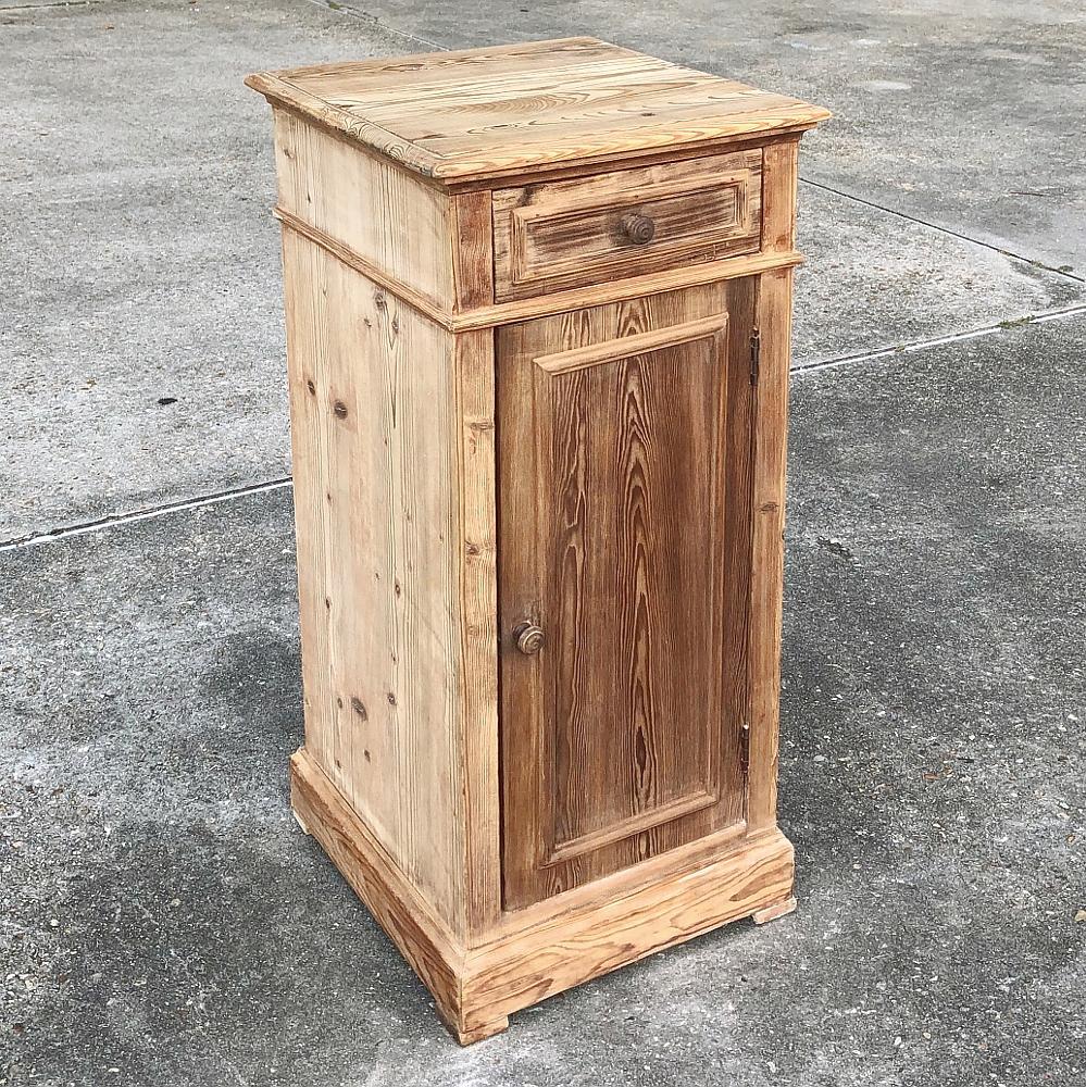 19th Century Country French Pine Nightstand is a great cabinet for a variety of uses ~ and its rustic charm will work with any casual decor. Solid planks of old-growth yellow pine were enhanced with a beveled top, molding around the drawer and door