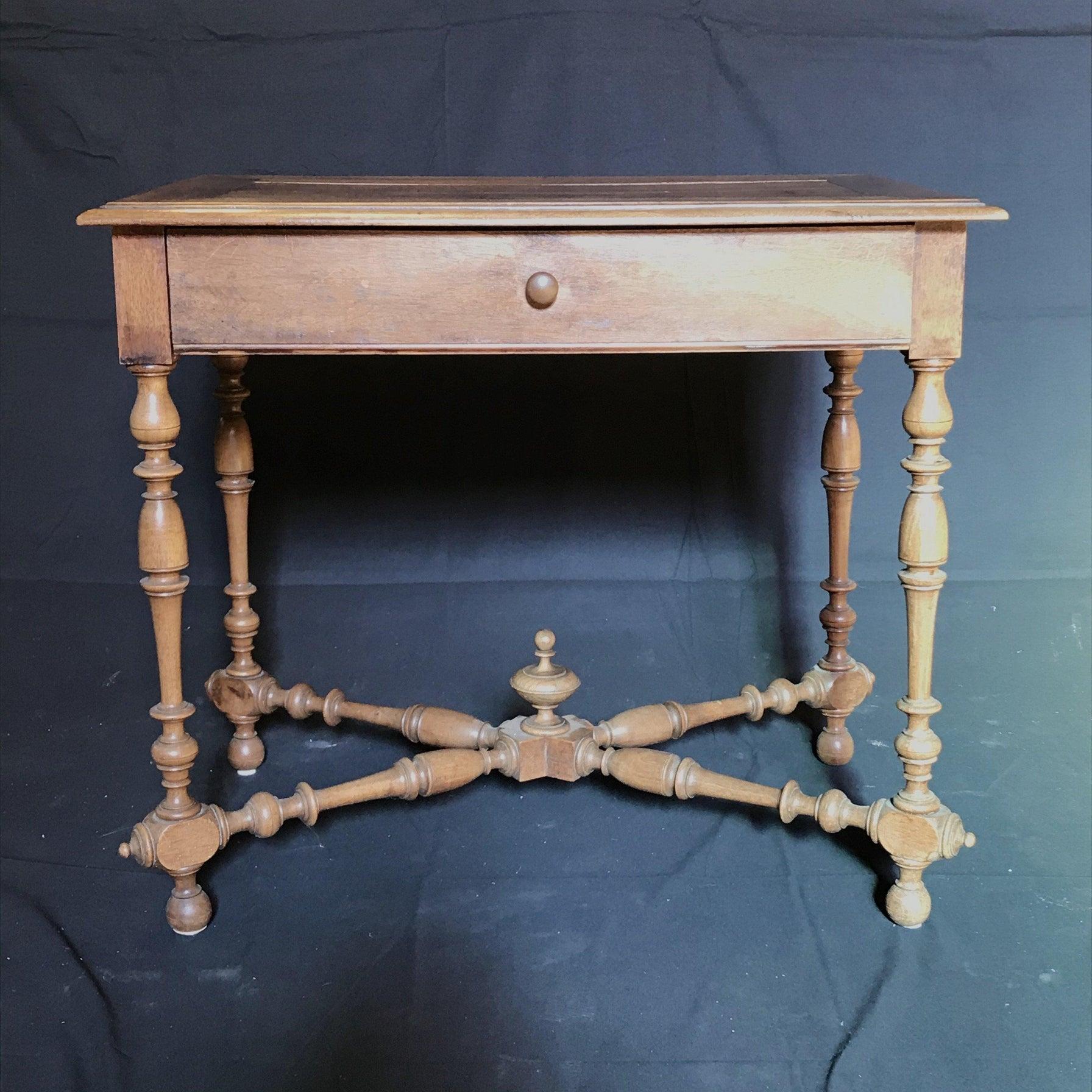 Lovely walnut side or accent table with bordered side top and one drawer. Intricate and beautiful carved and turned legs and stretchers. Can also serve as a night stand or bedside table.
#4694

 Measures: H skirt 23.75”.