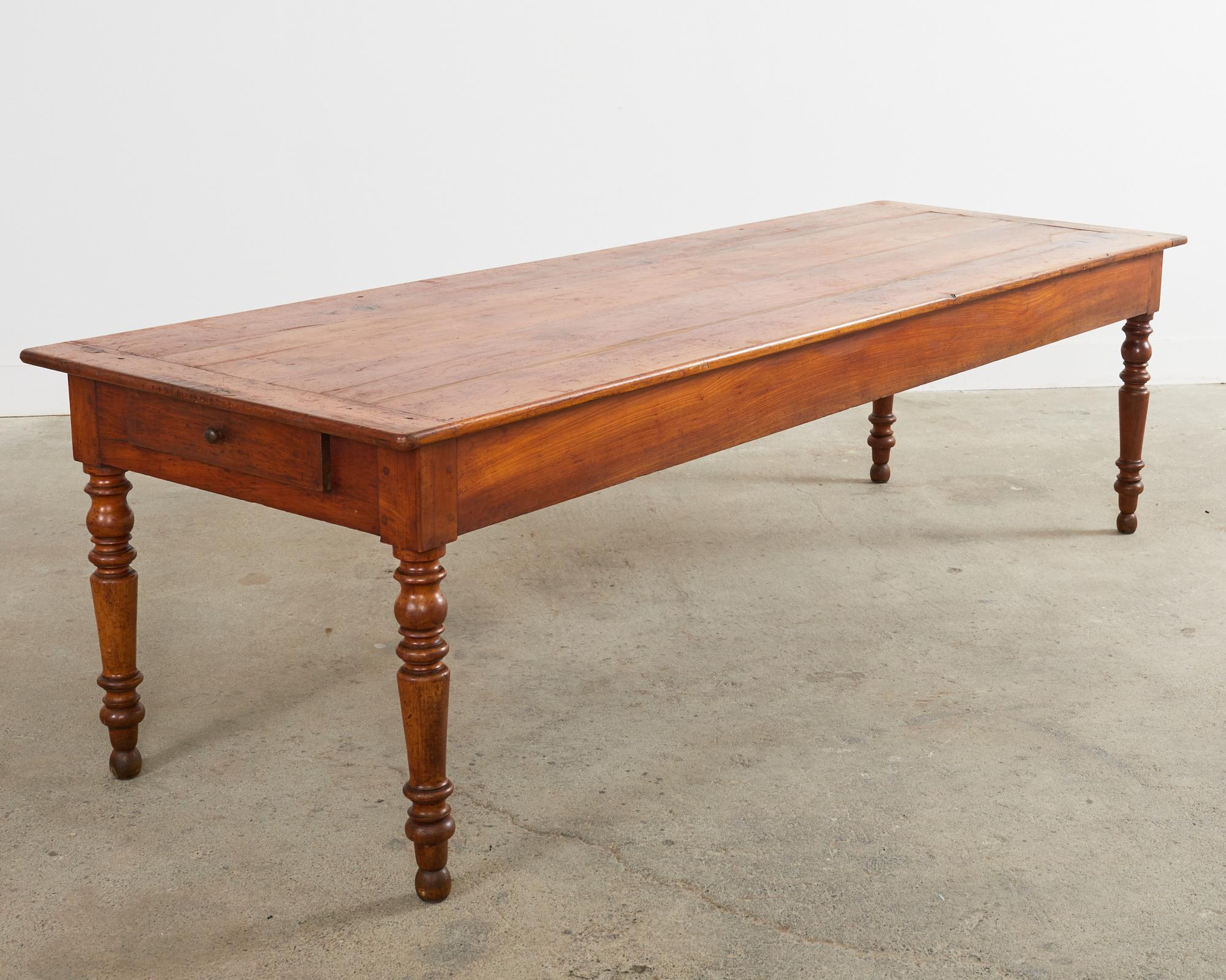 Hand-Crafted 19th Century Country French Provincial Fruitwood Farmhouse Harvest Table For Sale