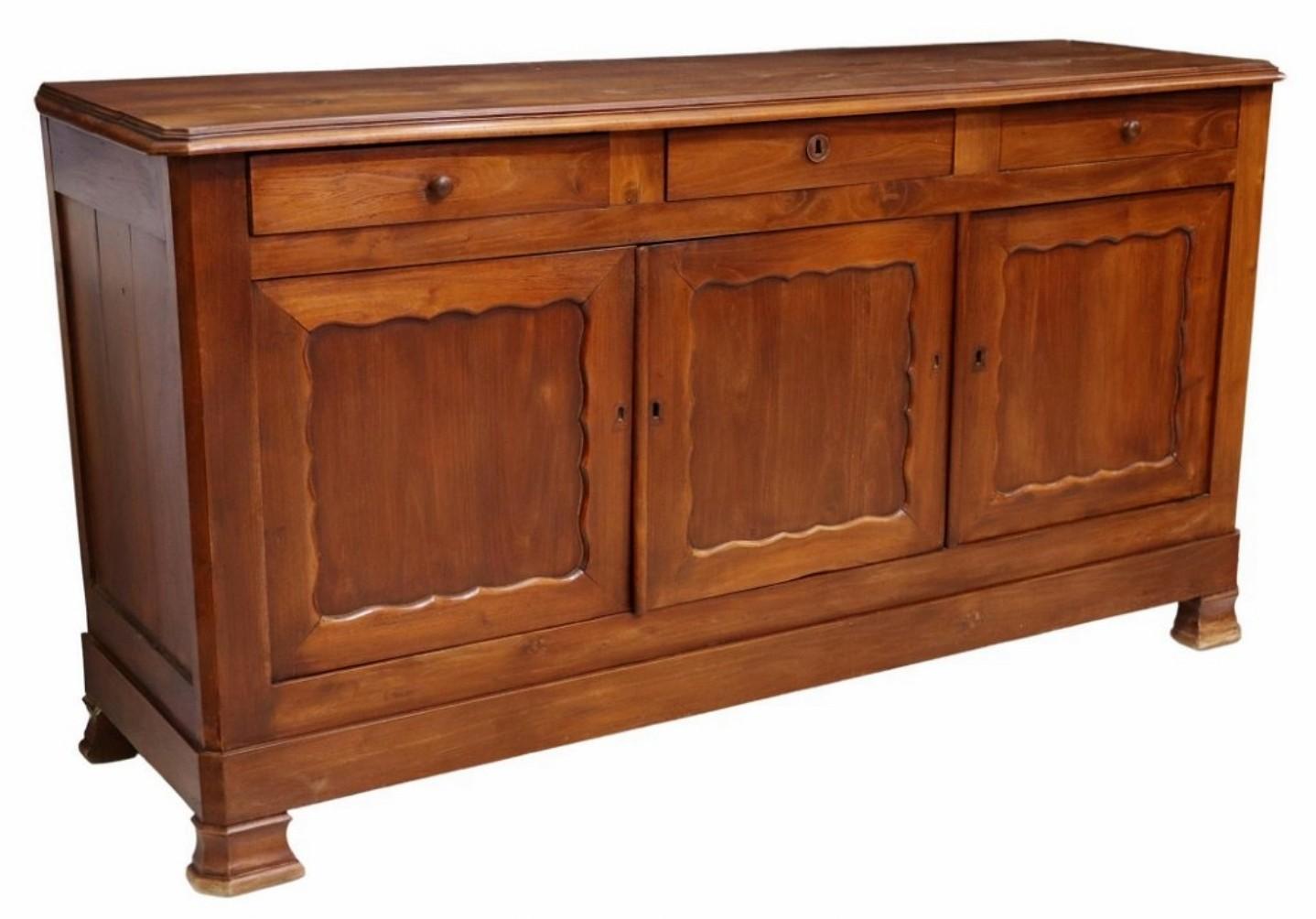 Add a touch of rustic warmth, elegance, and unpretentious sophistication with this antique country French fruitwood enfilade.

Born in Provincial France in the late 19th century, hand-crafted of warm rich solid fruitwood with attractive grain