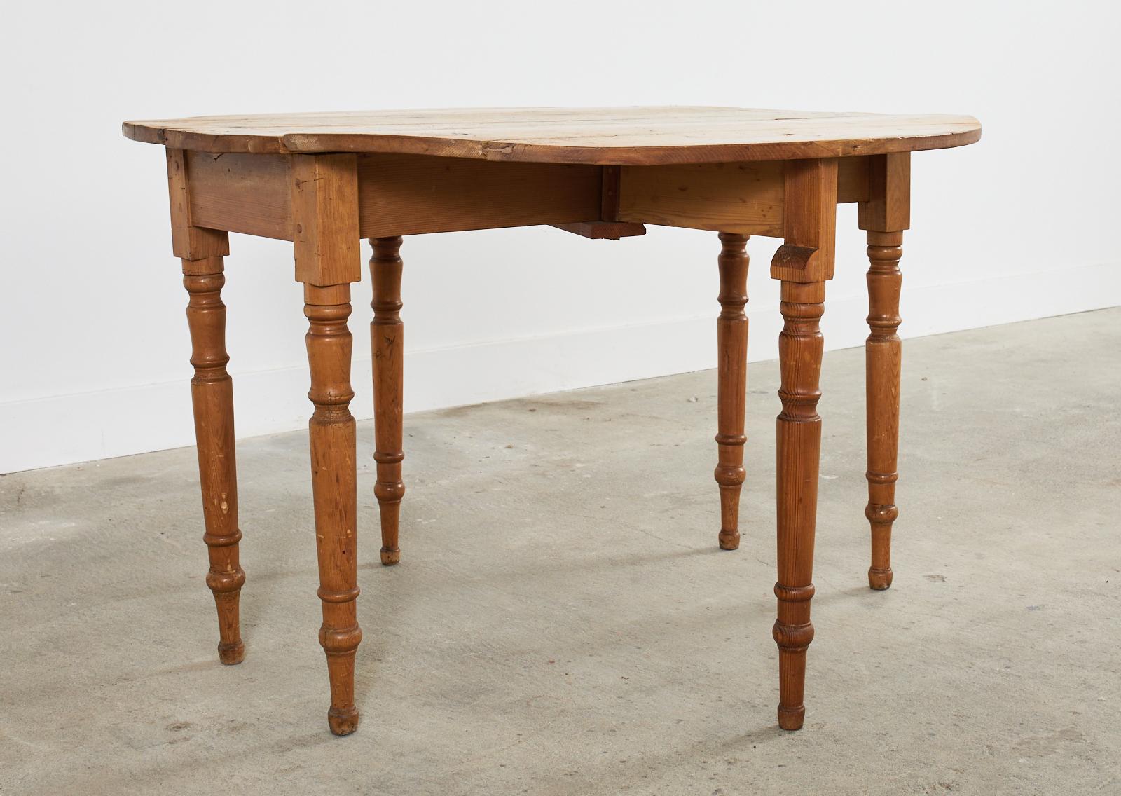 Hand-Crafted 19th Century Country French Provincial Pine Drop Leaf Dining Table For Sale