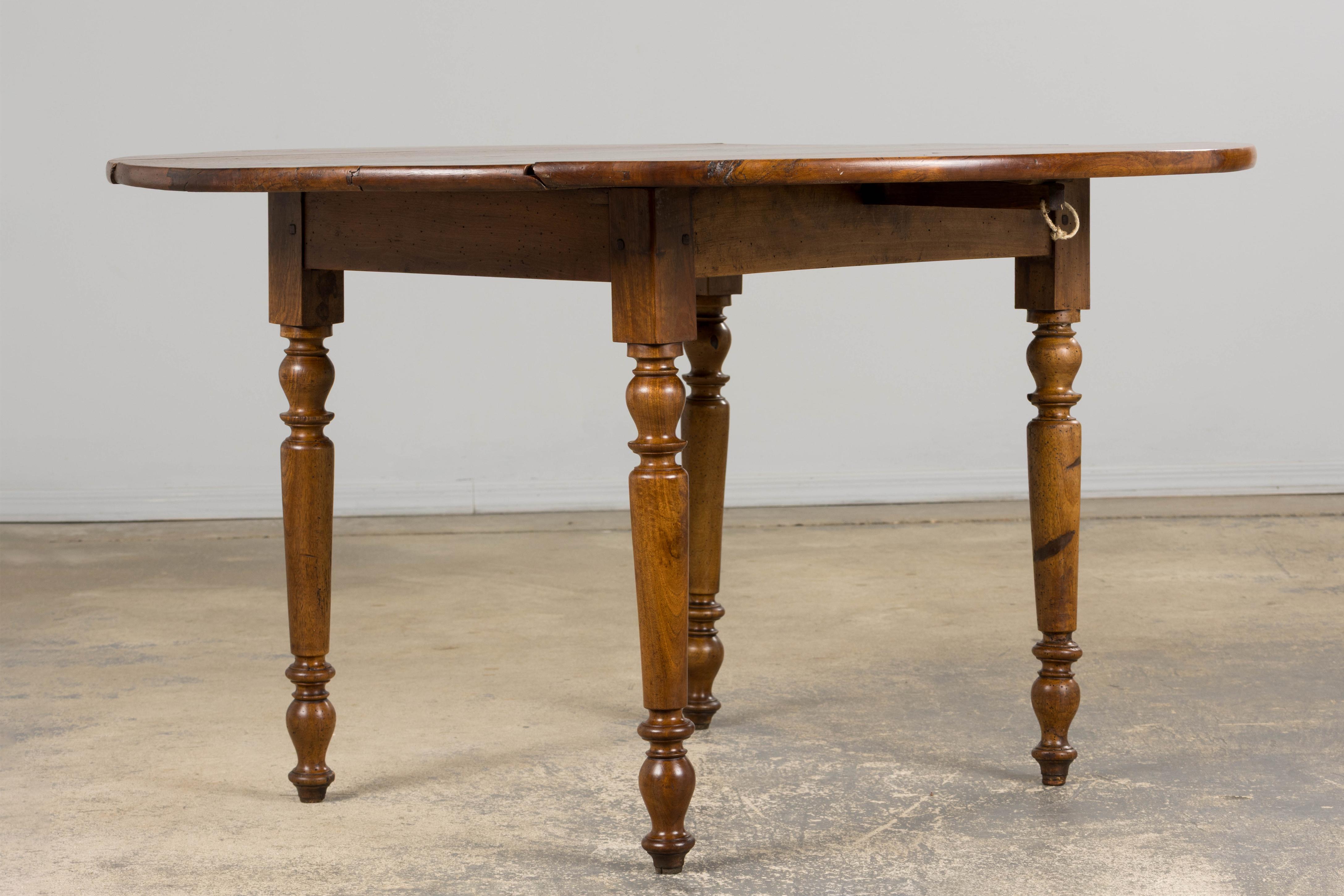 19th Century Country French Provincial Walnut Drop Leaf Table For Sale 10
