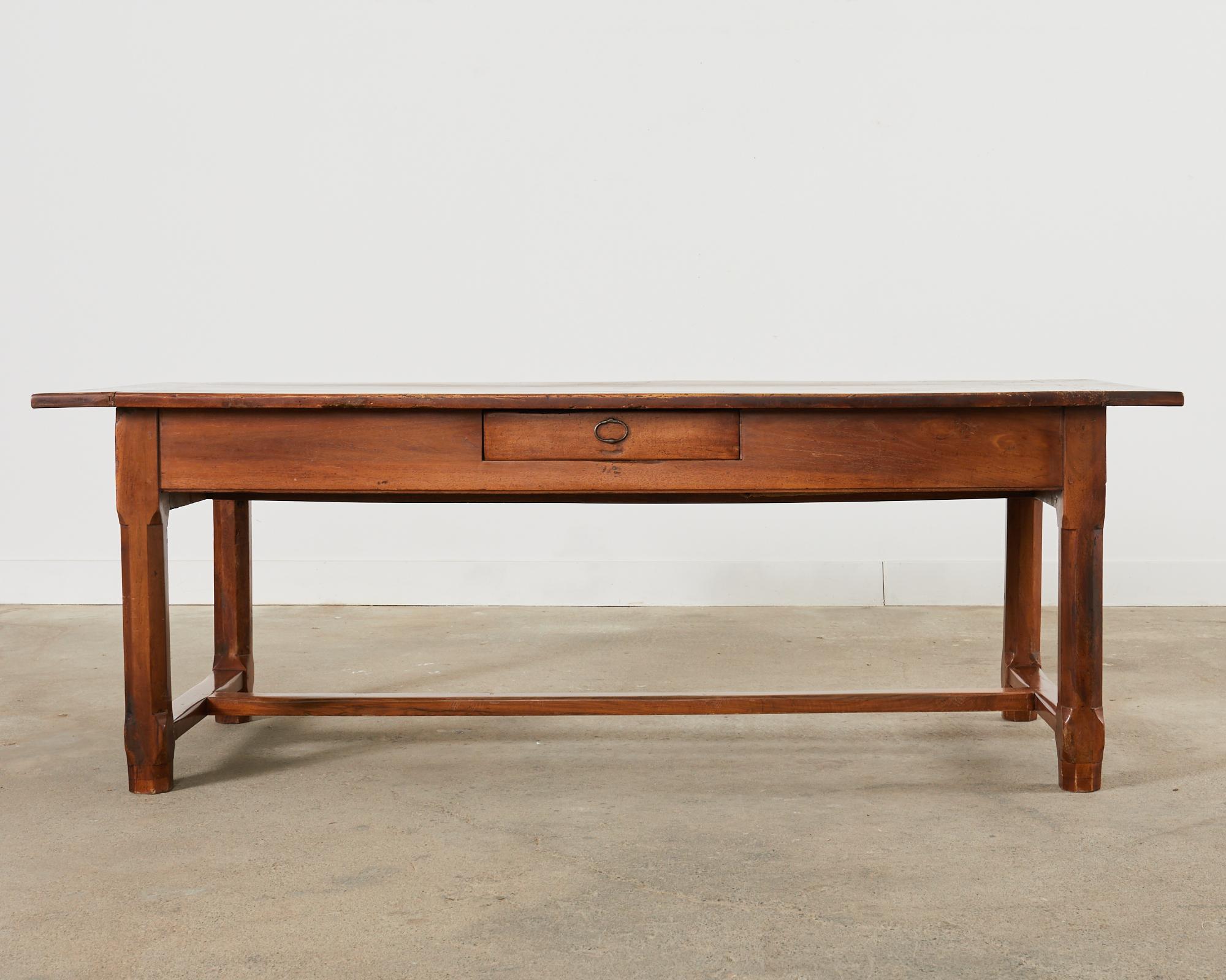 Hand-Crafted 19th Century Country French Provincial Walnut Farmhouse Trestle Table For Sale