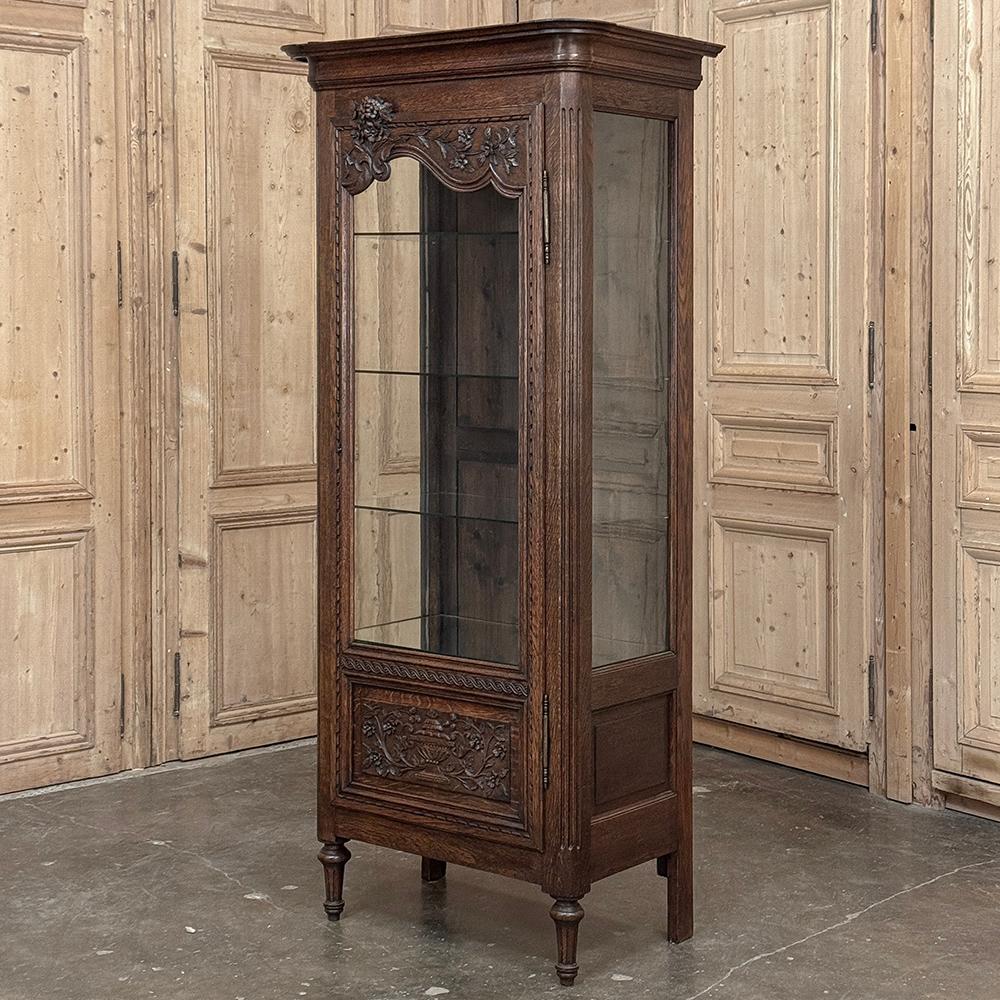 19th Century Country French Regence Vitrine ~ Curio Cabinet is an interesting blend of styles not uncommon in those produced in the provinces, and in this case a blending of Louis XV Rococo styling at the top of the door, and Louis XVI classical