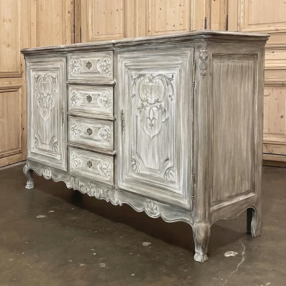 19th century Country French Regence whitewashed buffet is an exceptional choice for adding form, function and style to any room! Less than 20