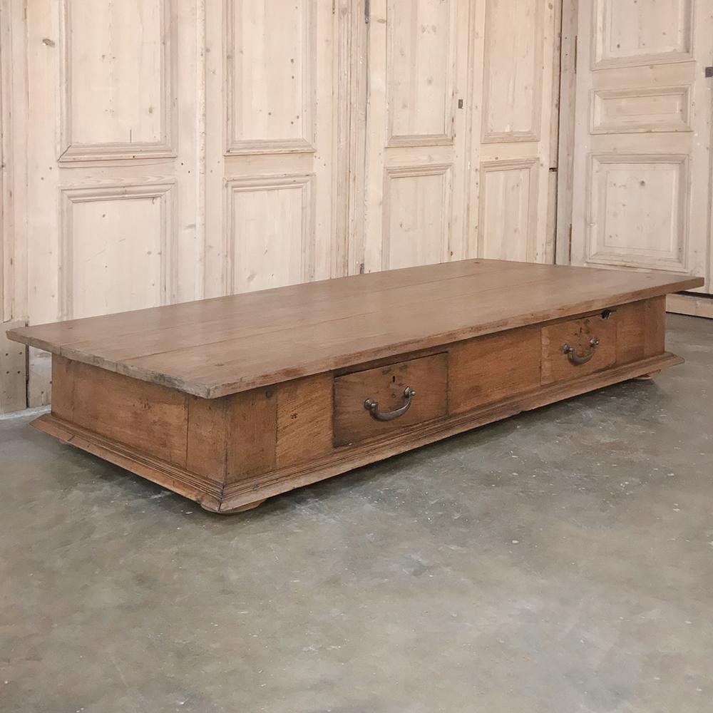 18th century country French rustic coffee table is perfect for a large, casual space! Handcrafted from solid planks of old-growth sycamore, cut down from original farm table, it features a pair of convenient drawers and a big surface for a big