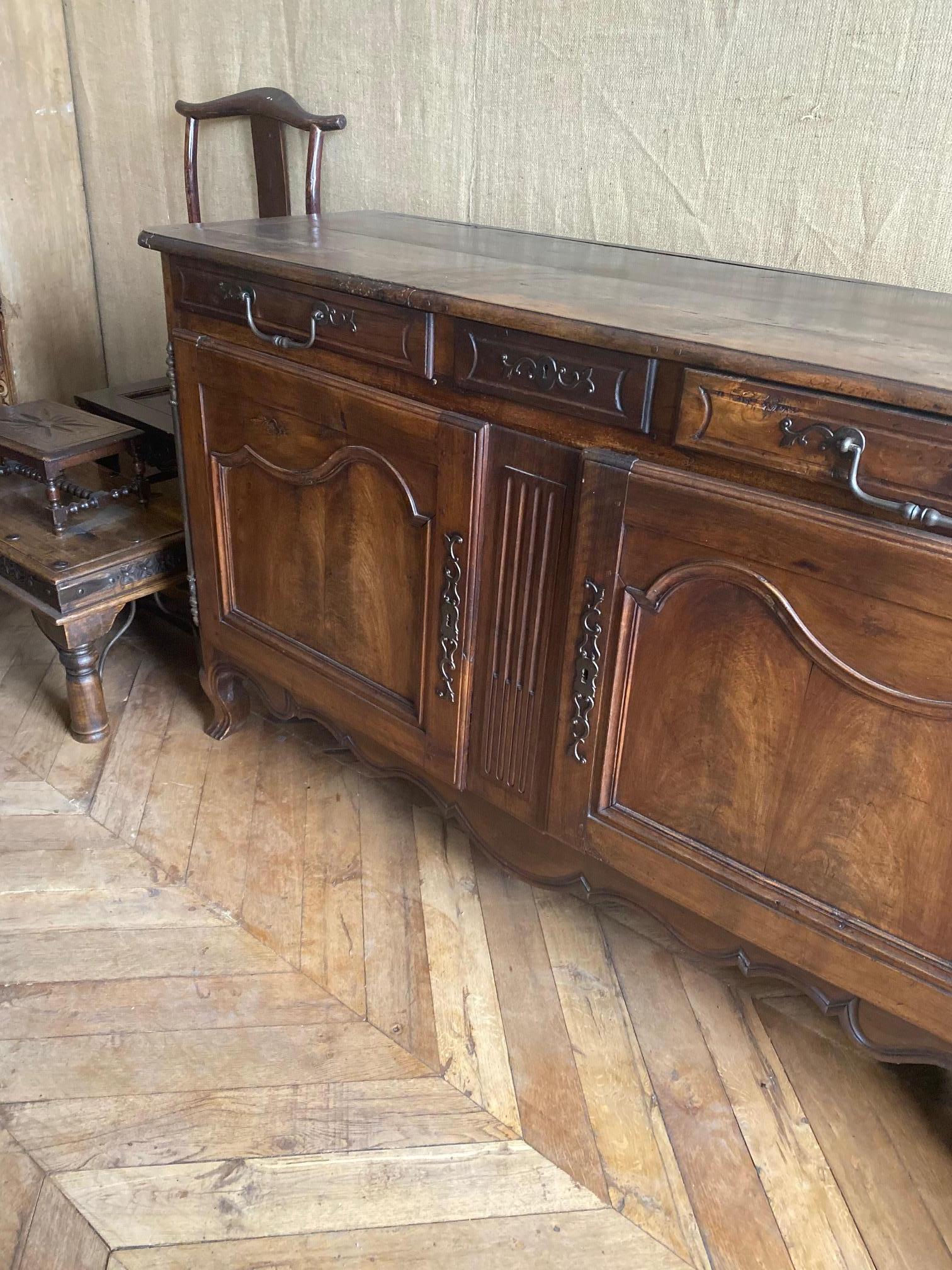 This country French server dates back to 1840. 

Measurements: 22'' D x 65.5'' W x 39'' H.