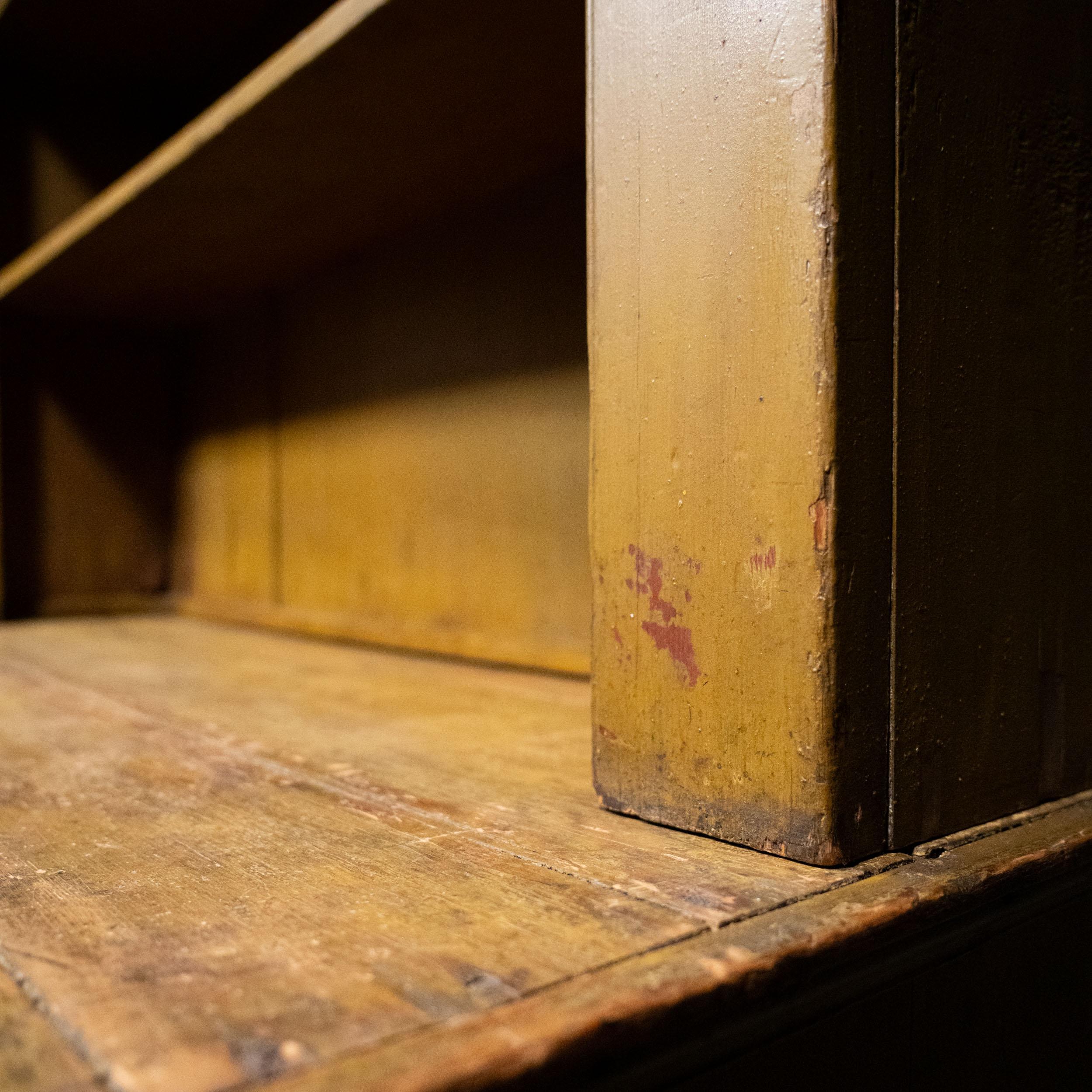 A very early American open dish cupboard in original ochre painted surface , restoration free, recently acquired from a private collection in Vancouver.. 

Thus colour has oxidized very well to a yellow /olive patina …it is currently two piece , but