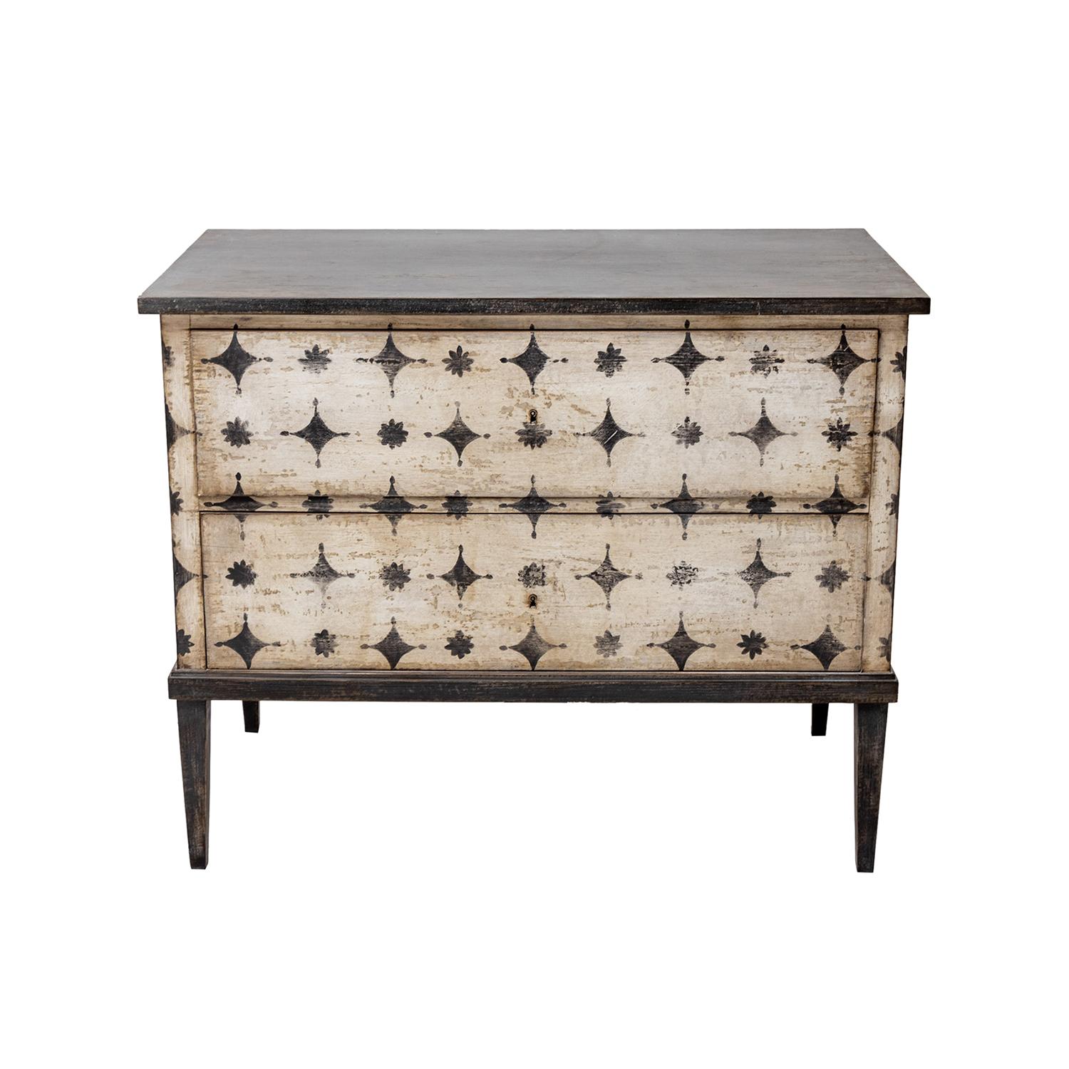 A cream-white, antique Italian single commode in the Arte Povera technique, made of hand crafted painted Pinewood in good condition. The Tuscan cabinet, cupboard is composed with a black top and two large drawers which is consisting its original