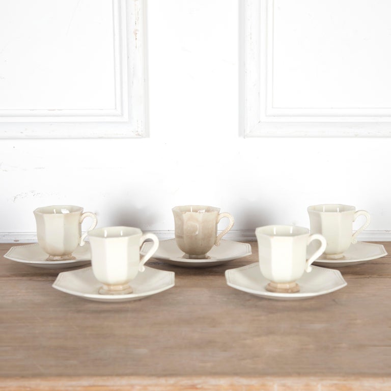 Set of five 19th century French creamware coffee cups and saucers, by Creil Montreau.