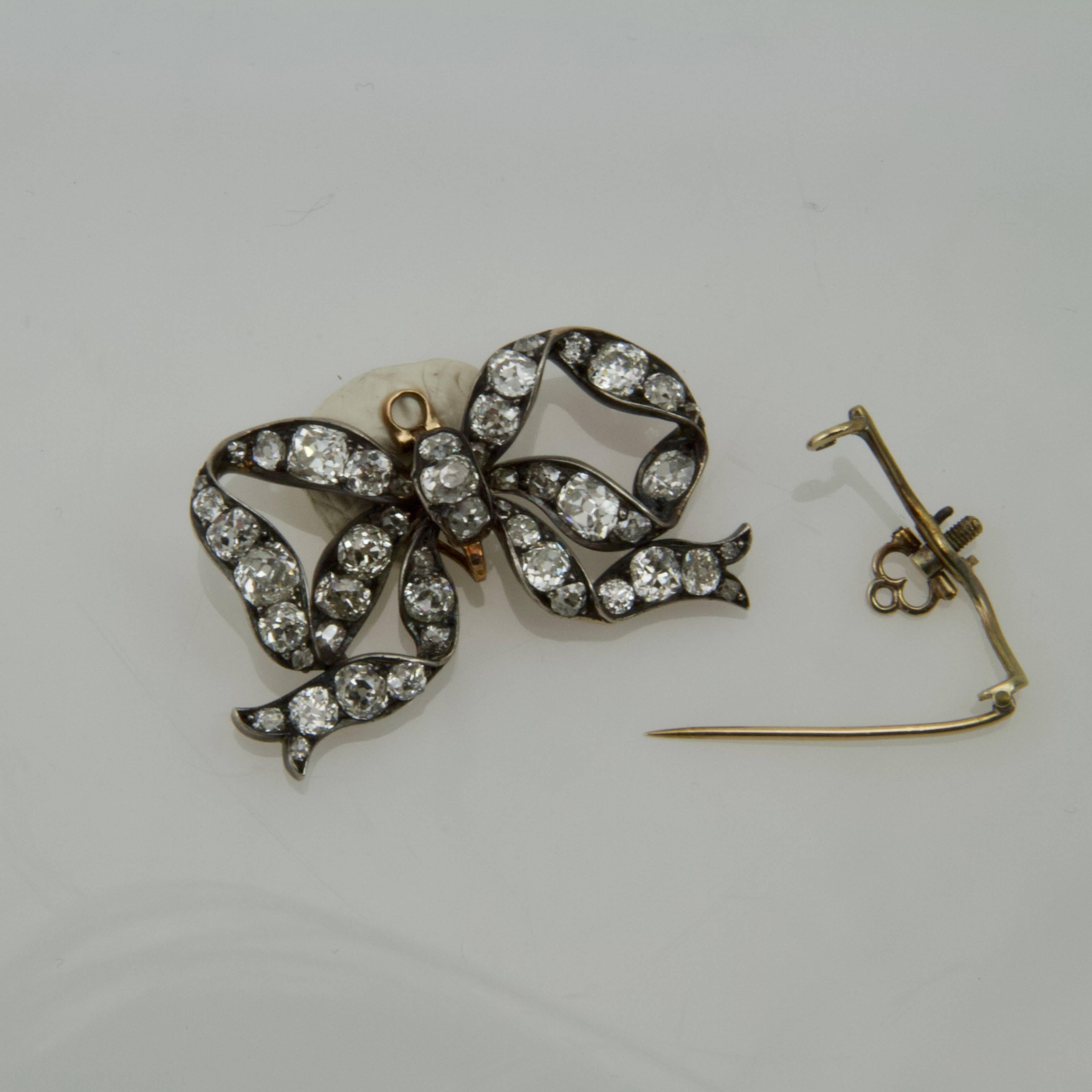 Women's or Men's 19th Century Cultured Pearl and Diamond Bow Brooch For Sale