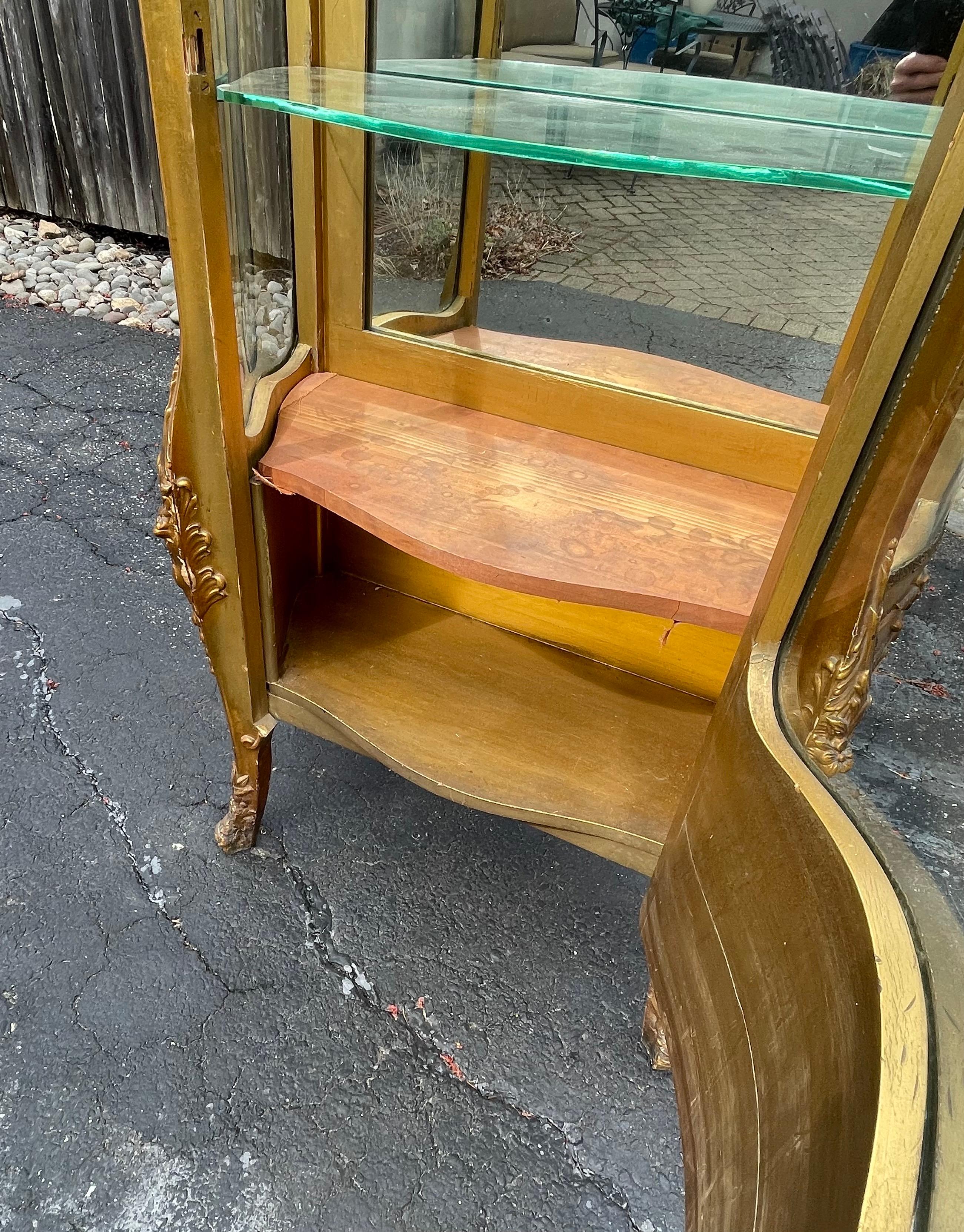 French Provincial 19th Century Curved Glass Ornate Gold Vitrine, France For Sale