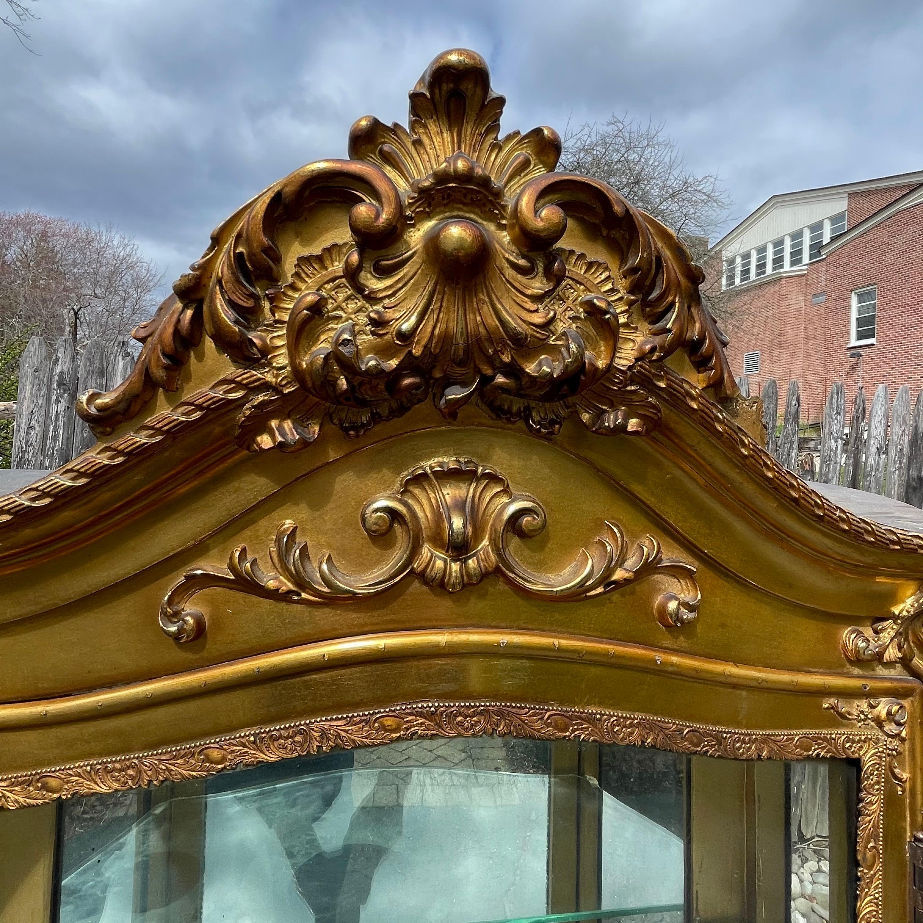 Gilt 19th Century Curved Glass Ornate Gold Vitrine, France For Sale