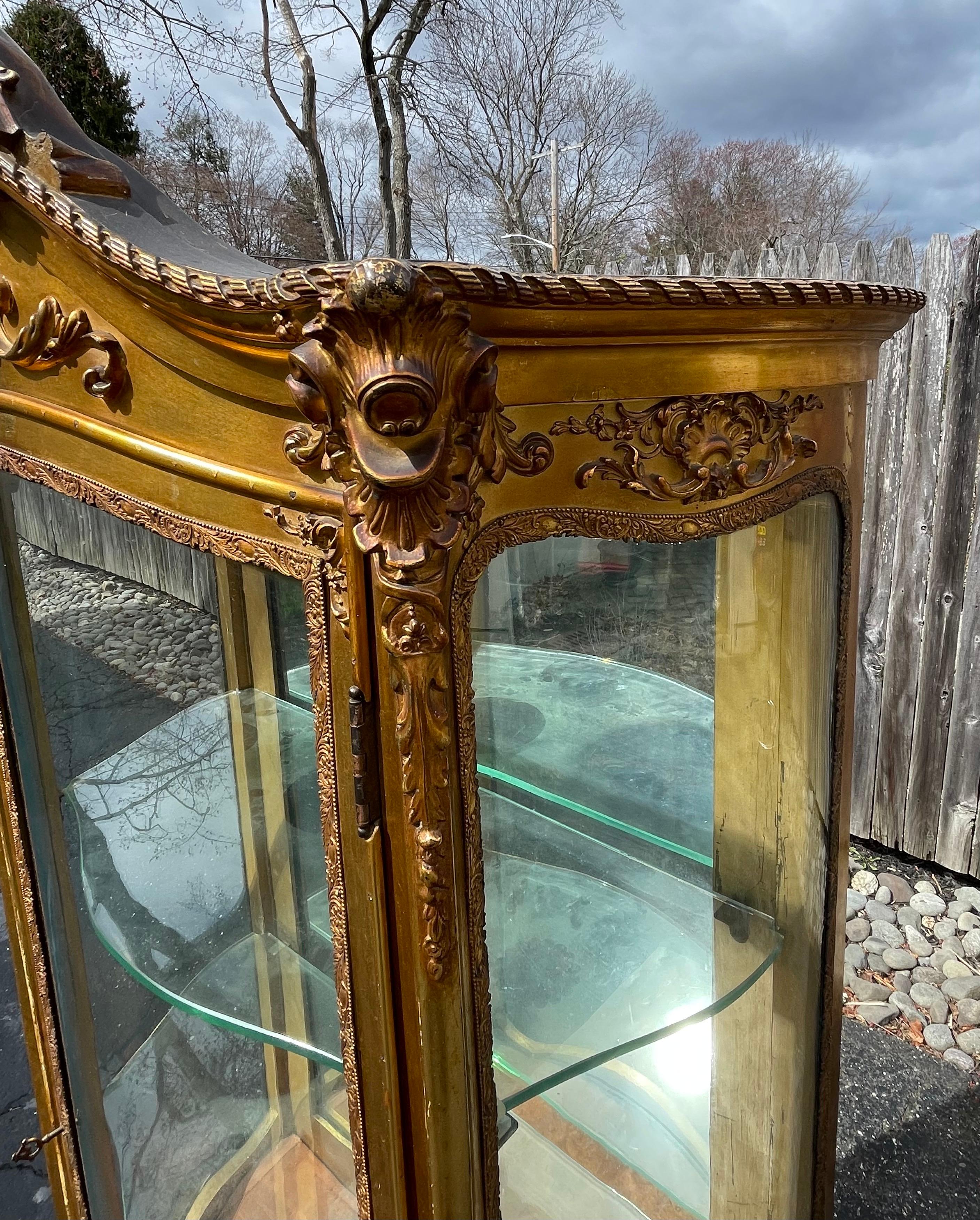 Wood 19th Century Curved Glass Ornate Gold Vitrine, France For Sale