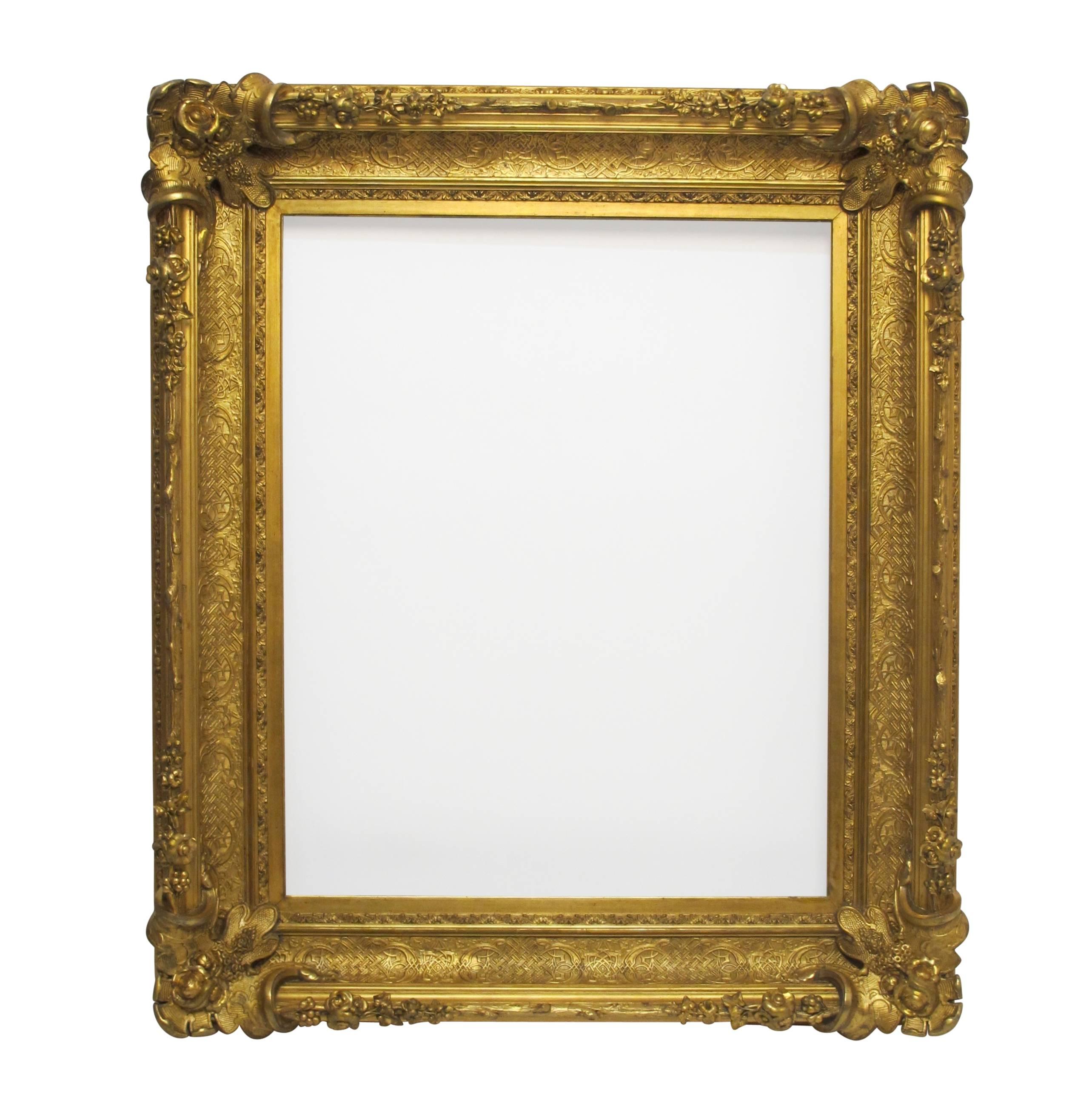 A 19th century custom made museum quality frame. Highly carved and embellished gilt plaster over wood frame.
The interior or sight measurements are 28.5 inches high x 36 inches wide.